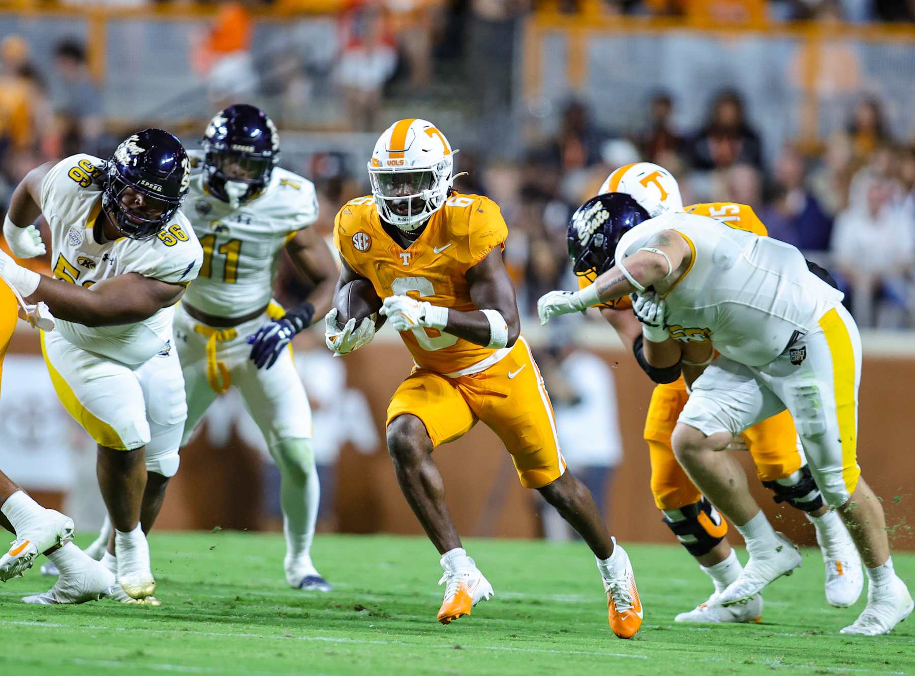 NASHVILLE, TENNESSEE - SEPTEMBER 14: Dylan Sampson #6 of the Tennessee Volunteers bust through the Kent State Golden Flashes defensive line during the first half at Neyland Stadium on September 14, 2024 in Knoxville, Tennessee. (Photo by Brandon Sumrall/Getty Images)