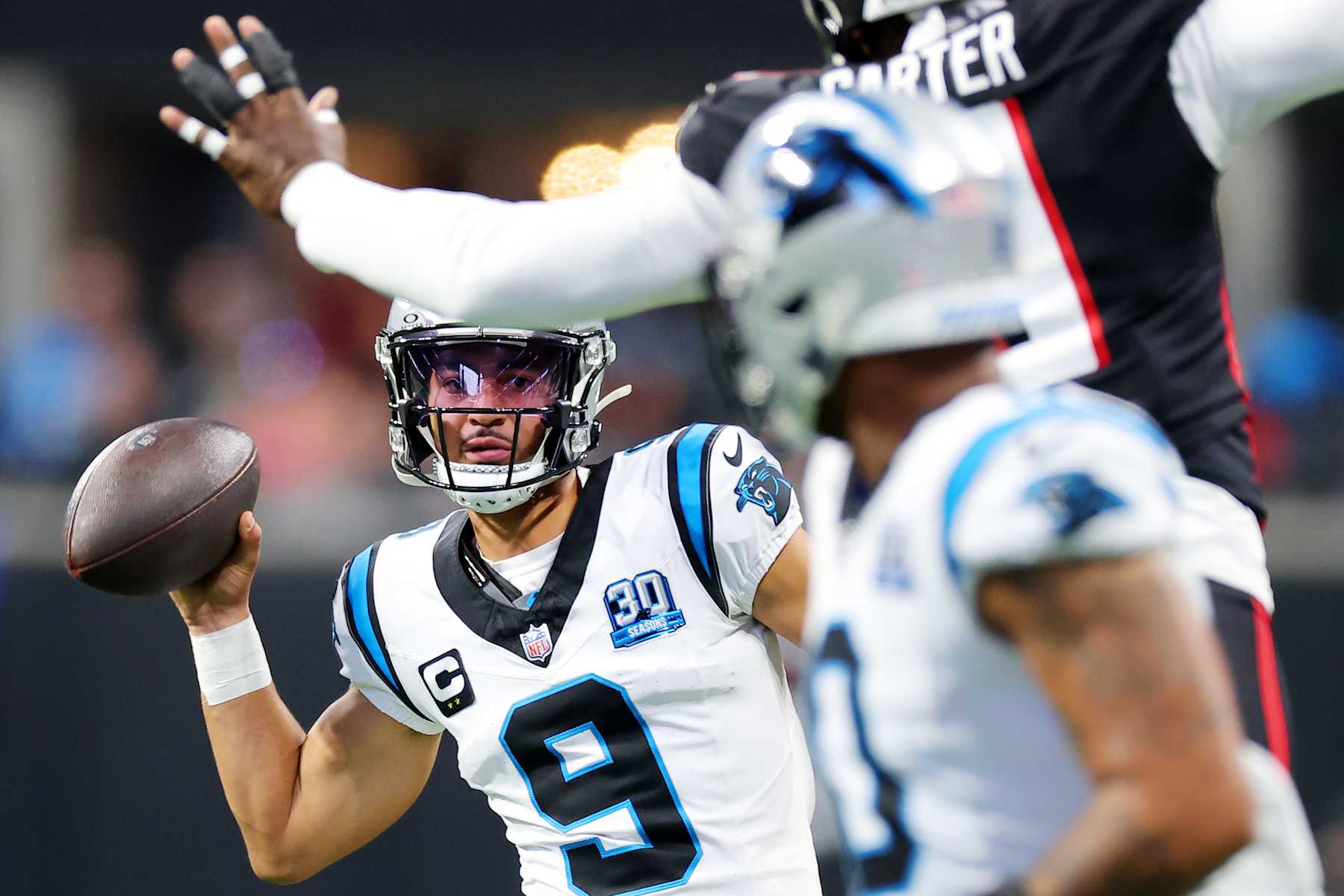ATLANTA, GEORGIA - JANUARY 05: Bryce Young #9 of the Carolina Panthers looks to pass against the Atlanta Falcons during the second quarter at Mercedes-Benz Stadium on January 05, 2025 in Atlanta, Georgia. (Photo by Kevin C. Cox/Getty Images)