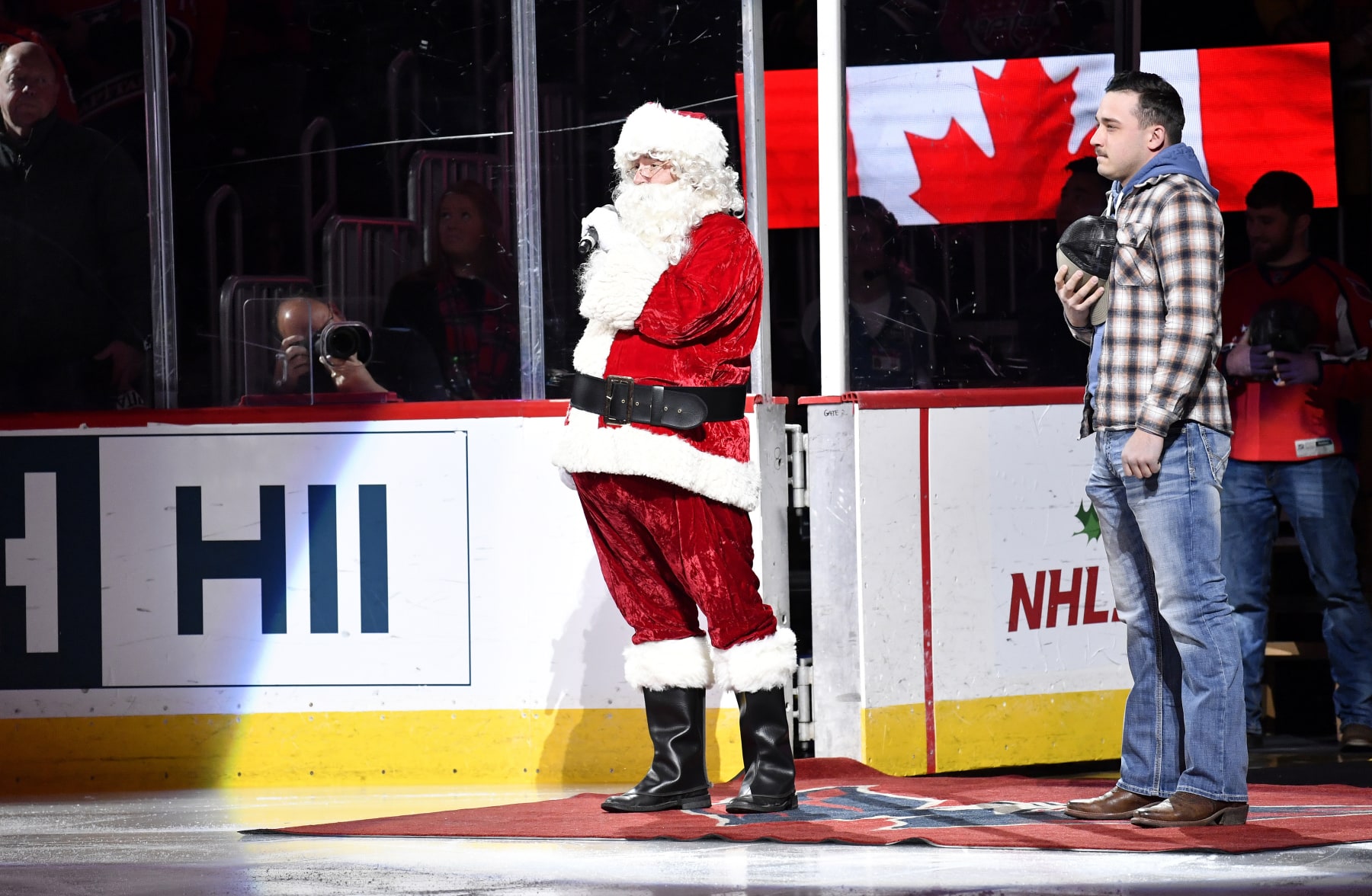 WASHINGTON, DC - DECEMBER 23: Santa Claus (Kris Kringle, Father Christmas) sings the Canadian National Anthem and United States National Anthem before the Winnipeg Jets versus Washington Capitals National Hockey League game on December 23, 2022 at Capital One Arena in Washington, D.C.. (Photo by Randy Litzinger/Icon Sportswire via Getty Images) WASHINGTON, DC - DECEMBER 23: Santa Claus (Kris Kringle, Father Christmas) sings the Canadian National Anthem and United States National Anthem before the Winnipeg Jets versus Washington Capitals National Hockey League game on December 23, 2022 at Capital One Arena in Washington, D.C.. (Photo by Randy Litzinger/Icon Sportswire via Getty Images)