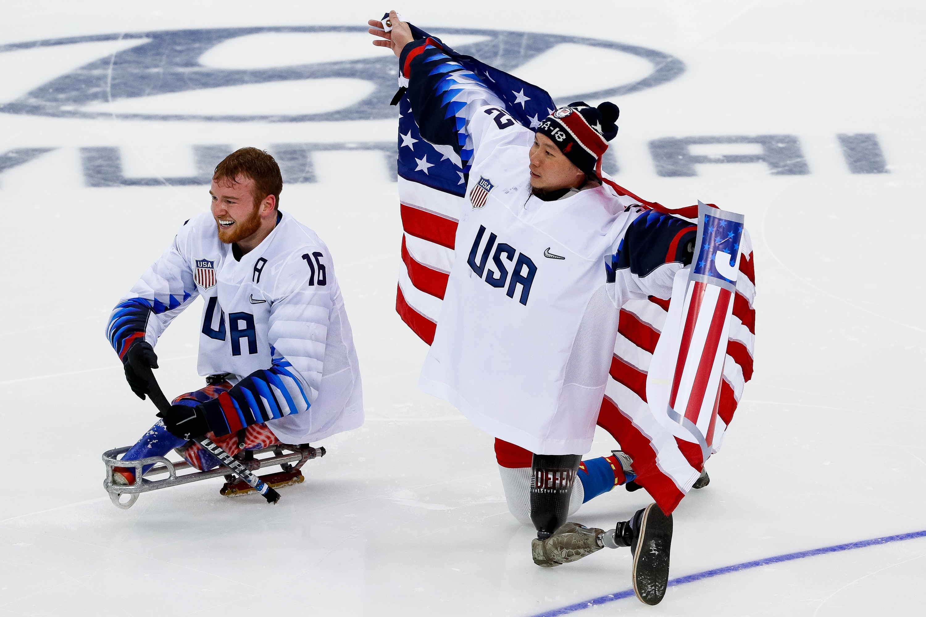 GANGNEUNG, SOUTH KOREA - MARCH 18: Declan Farmer and a goalkeeper Jen Lee of the United States celebrates the gold medal after winning in the Ice Hockey gold medal game between United States and Canada during day nine of the PyeongChang 2018 Paralympic Games on March 18, 2018 in Gangneung, South Korea. (Photo by Buda Mendes/Getty Images)