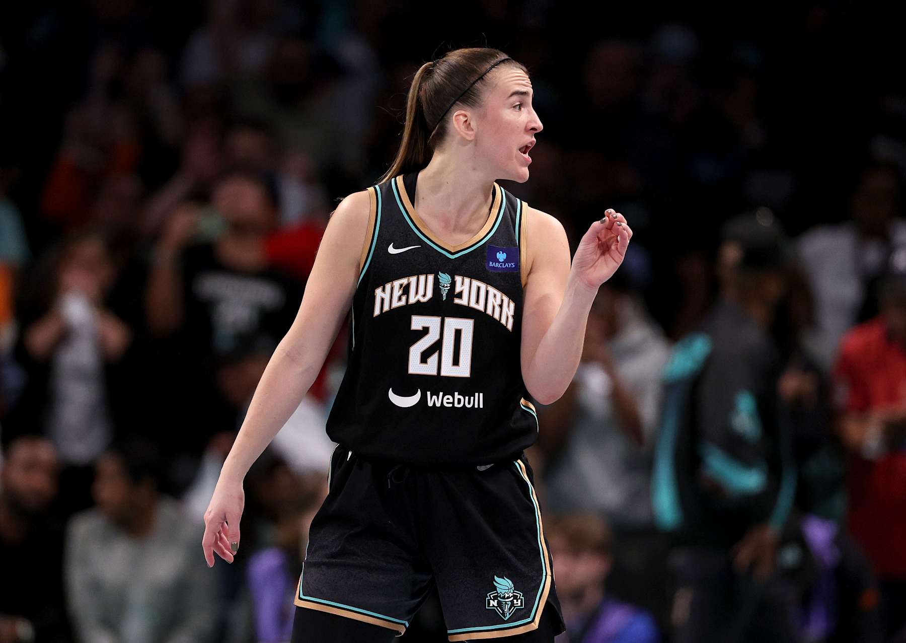 NEW YORK, NEW YORK - OCTOBER 20: Sabrina Ionescu #20 of the New York Liberty reacts in the fourth quarter against the Minnesota Lynx during Game Five of the WNBA Finals at Barclays Center on October 20, 2024 in the Brooklyn borough of New York City. The New York Liberty defeated the Minnesota Lynx 67-62 in overtime to win the championship. NOTE TO USER: User expressly acknowledges and agrees that, by downloading and or using this photograph, User is consenting to the terms and conditions of the Getty Images License Agreement. (Photo by Elsa/Getty Images)