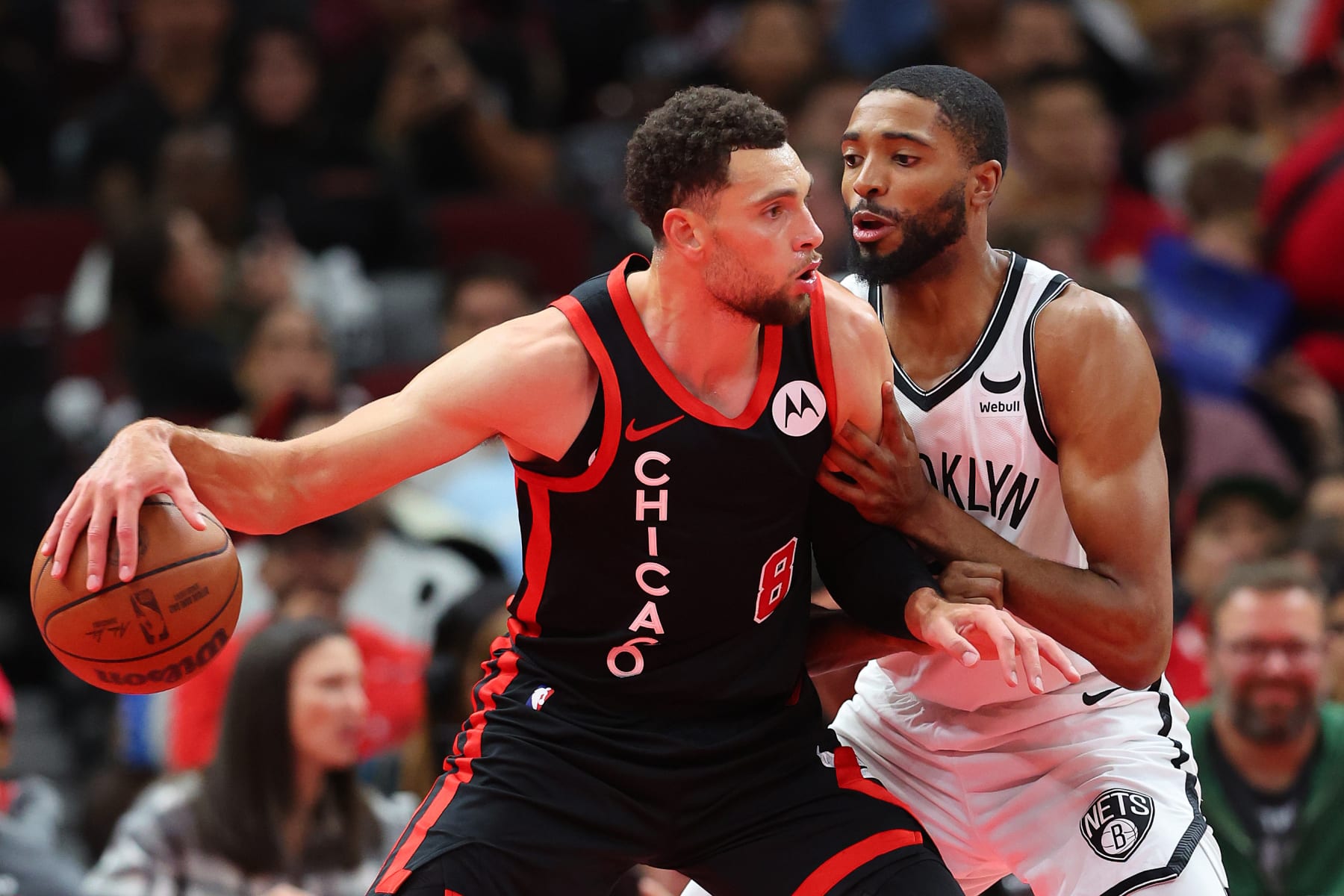 CHICAGO, ILLINOIS - NOVEMBER 03: Zach LaVine #8 of the Chicago Bulls drives to the basket against Mikal Bridges #1 of the Brooklyn Nets in the second half of the NBA In-Season Tournament at the United Center on November 03, 2023 in Chicago, Illinois. NOTE TO USER: User expressly acknowledges and agrees that, by downloading and or using this photograph, User is consenting to the terms and conditions of the Getty Images License Agreement. (Photo by Michael Reaves/Getty Images)