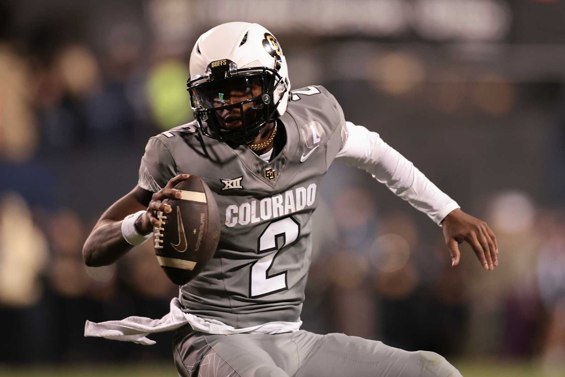 BOULDER, COLORADO - OCTOBER 26: Shedeur Sanders #2 of the Colorado Buffaloes runs with the ball during the second quarter against the Cincinnati Bearcats at Folsom Field on October 26, 2024 in Boulder, Colorado. (Photo by Andrew Wevers/Getty Images)