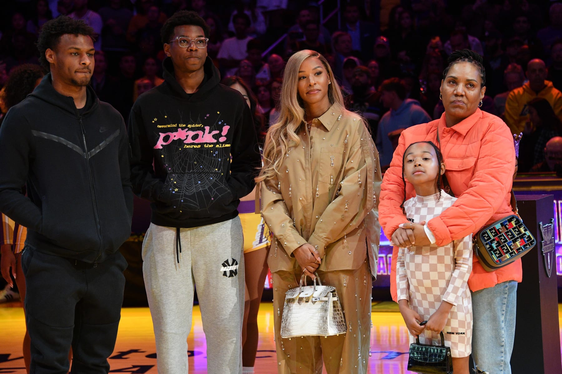 From left, Bronny, Bryce and Savannah James.