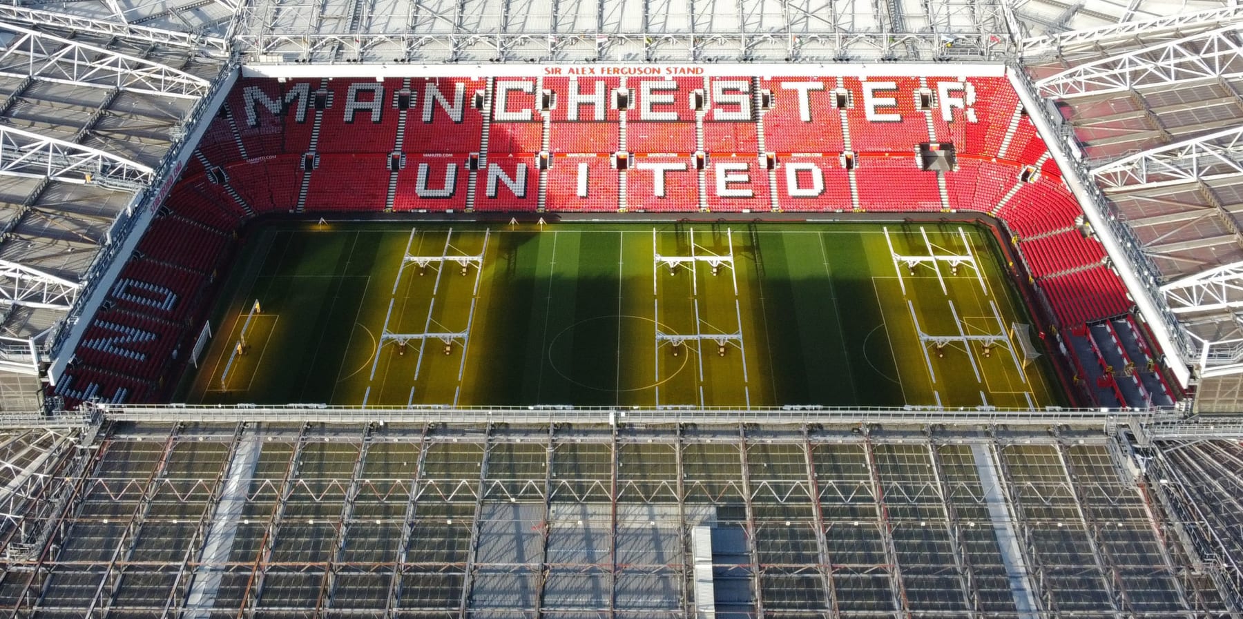 An aerial view shows Old Trafford stadium, home ground of to Manchester United football team, in Manchester, northern England, on November 23, 2022. - Manchester United's owners said Tuesday they were ready to sell the club after it was earlier confirmed star player Cristiano Ronaldo was leaving the Premier League giants. Weeks of turbulence at Old Trafford appeared to have come to an end when the club announced Ronaldo was leaving with "immediate effect". (Photo by Oli SCARFF / AFP) (Photo by OLI SCARFF/AFP via Getty Images)
