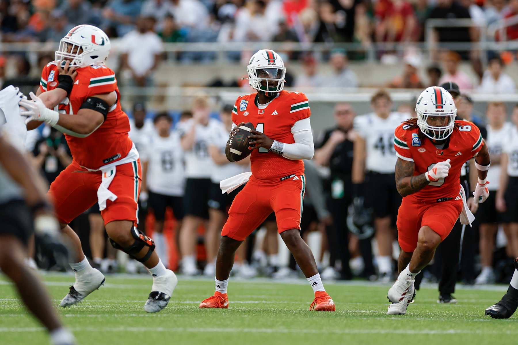 ORLANDO, FL - DECEMBER 28: Miami Hurricanes quarterback Cam Ward (1) throws a pass during the game between the Miami Hurricanes and the Iowa State Cyclones on December 28, 2024 at Camping World Stadium in Orlando, Fl. (Photo by David Rosenblum/Icon Sportswire via Getty Images)