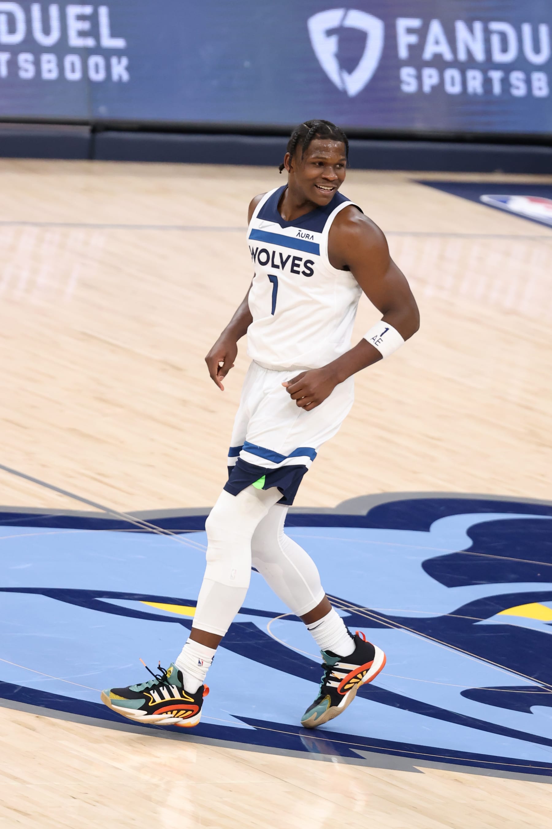 MEMPHIS, TN - APRIL 26: Anthony Edwards #1 of the Minnesota Timberwolves smiles during the game against the Memphis Grizzlies during Round 1 Game 5 of the NBA Playoffs on April 26, 2022 at FedExForum in Memphis, Tennessee. NOTE TO USER: User expressly acknowledges and agrees that, by downloading and or using this photograph, User is consenting to the terms and conditions of the Getty Images License Agreement. Mandatory Copyright Notice: Copyright 2022 NBAE (Photo by David Sherman/NBAE via Getty Images)