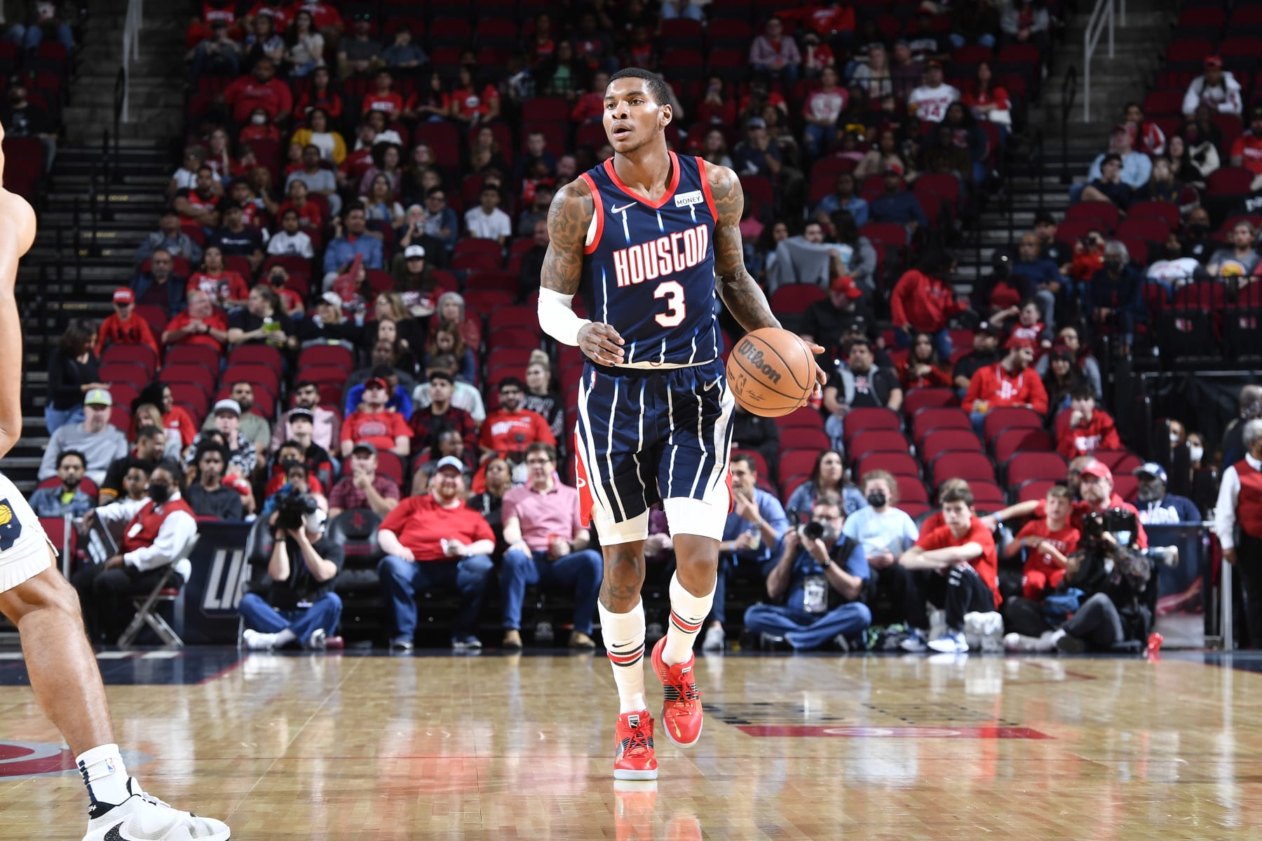 HOUSTON, TX - MARCH 18:  Kevin Porter Jr. #3 of the Houston Rockets handles the ball during the game against the Indiana Pacers on March 18, 2022 at the Toyota Center in Houston, Texas. NOTE TO USER: User expressly acknowledges and agrees that, by downloading and or using this photograph, User is consenting to the terms and conditions of the Getty Images License Agreement. Mandatory Copyright Notice: Copyright 2022 NBAE (Photo by Logan Riely/NBAE via Getty Images)