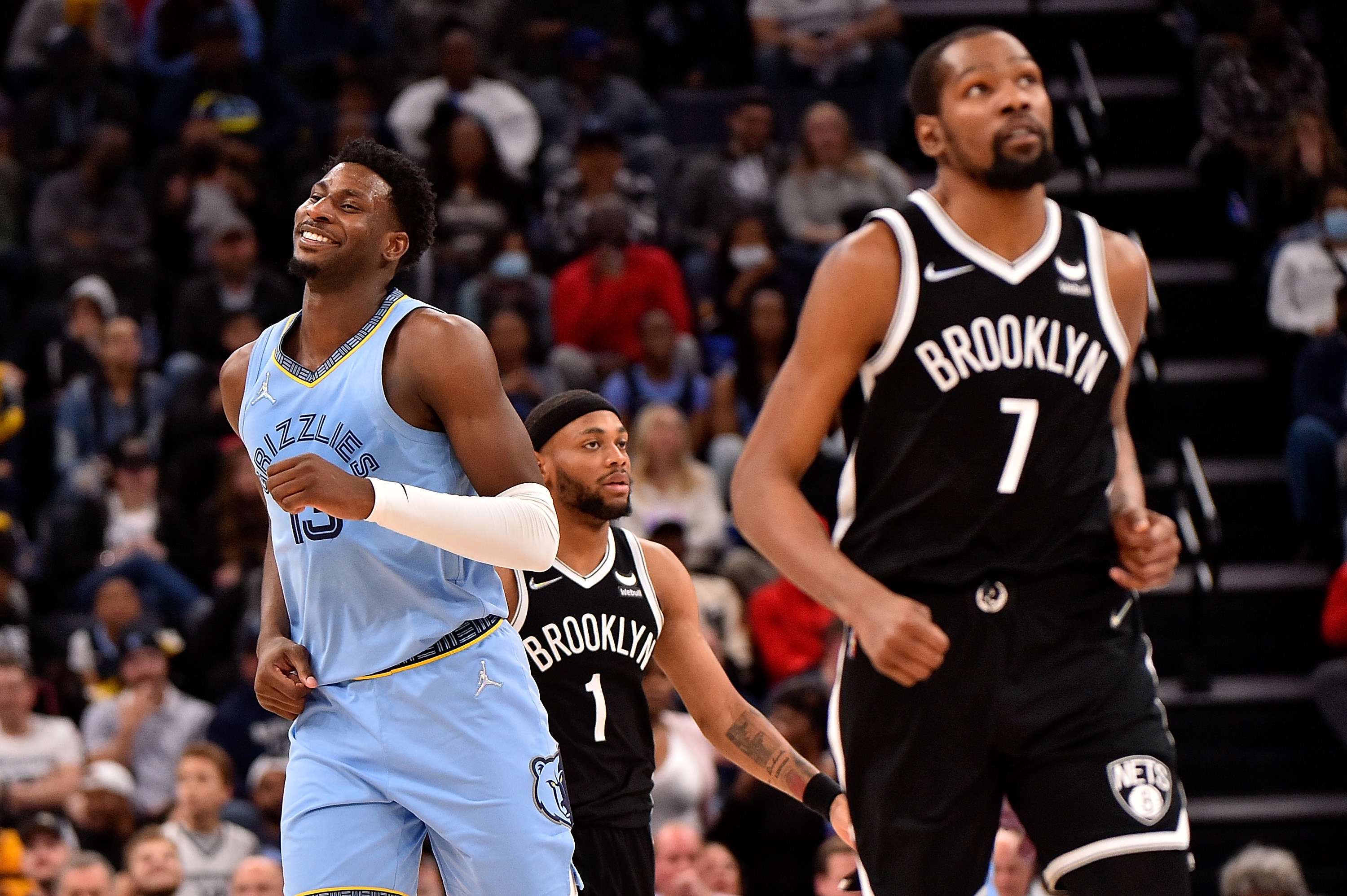 MEMPHIS, TENNESSEE - MARCH 23: Jaren Jackson Jr. #13 of the Memphis Grizzlies reacts during the game against Kevin Durant #7 of the Brooklyn Nets during the game at FedExForum on March 23, 2022 in Memphis, Tennessee. NOTE TO USER: User expressly acknowledges and agrees that , by downloading and or using this photograph, User is consenting to the terms and conditions of the Getty Images License Agreement. (Photo by Justin Ford/Getty Images)