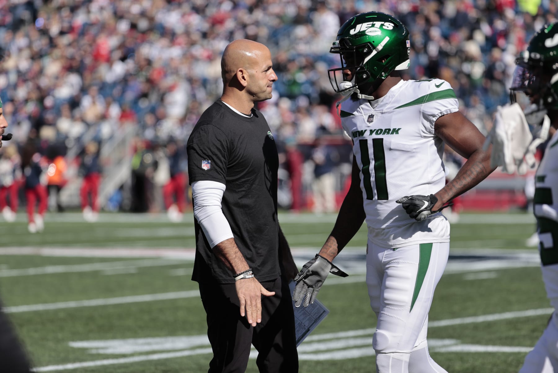 FOXBOROUGH, MA - OCTOBER 24: New York Jets head coach Robert Saleh greets New York Jets wide receiver Denzel Mims (11) before a game between the New England Patriots and the New York Jets on October 24, 2021, at Gillette Stadium in Foxborough, Massachusetts. (Photo by Fred Kfoury III/Icon Sportswire via Getty Images)