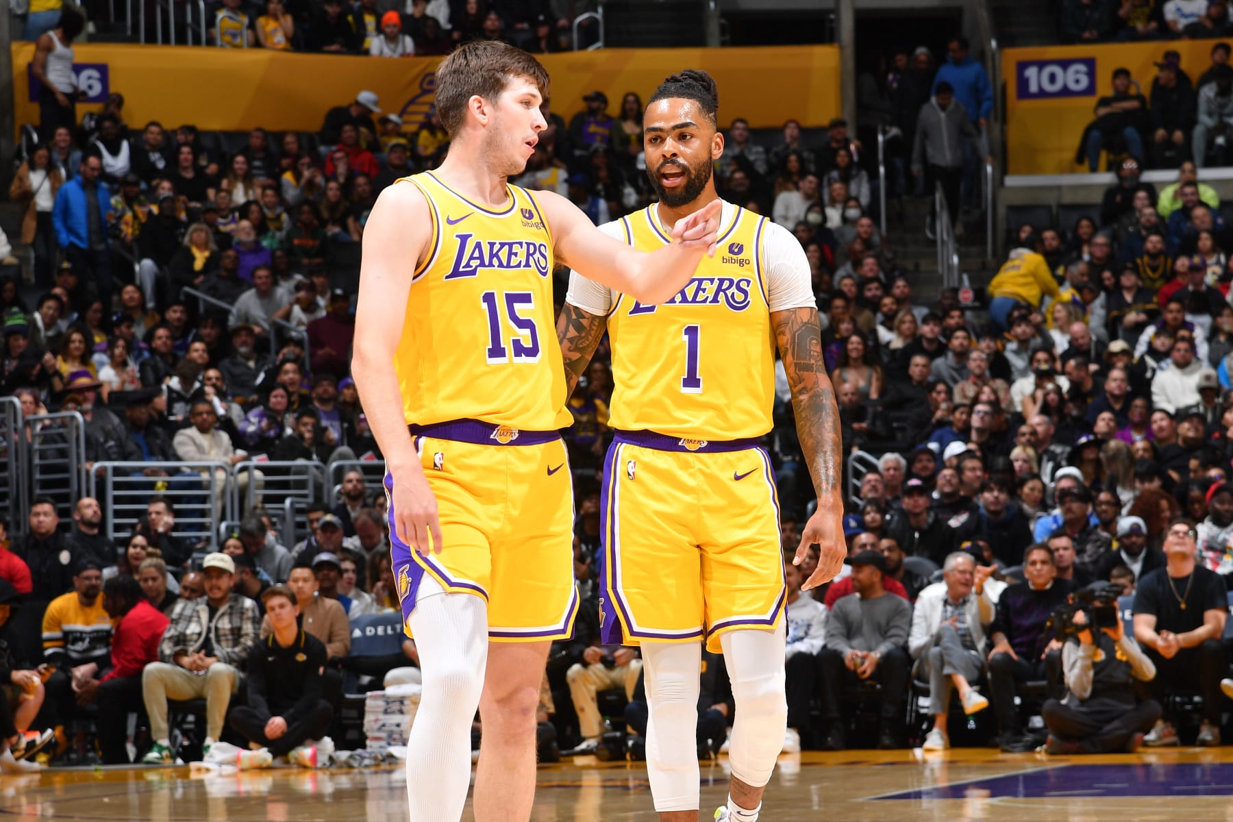 LOS ANGELES, CA - MARCH 6: D'Angelo Russell #1 and Austin Reaves #15 of the Los Angeles Lakers look on during the game against the Sacramento Kings on March 6, 2024 NBAE at Crypto.Com Arena in Los Angeles, California. NOTE TO USER: User expressly acknowledges and agrees that, by downloading and/or using this Photograph, user is consenting to the terms and conditions of the Getty Images License Agreement. Mandatory Copyright Notice: Copyright 2024 NBAE (Photo by Juan Ocampo/NBAE via Getty Images)