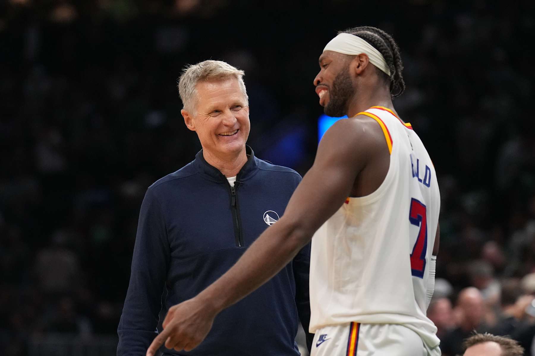 BOSTON, MA - NOVEMBER 6: Buddy Hield #7 and Head Coach Steve Kerr of the Golden State Warriors smile during the game against the Boston Celtics on November 6, 2024 at TD Garden in Boston, Massachusetts. NOTE TO USER: User expressly acknowledges and agrees that, by downloading and/or using this Photograph, user is consenting to the terms and conditions of the Getty Images License Agreement. Mandatory Copyright Notice: Copyright 2024 NBAE (Photo by Jesse D. Garrabrant/NBAE via Getty Images)