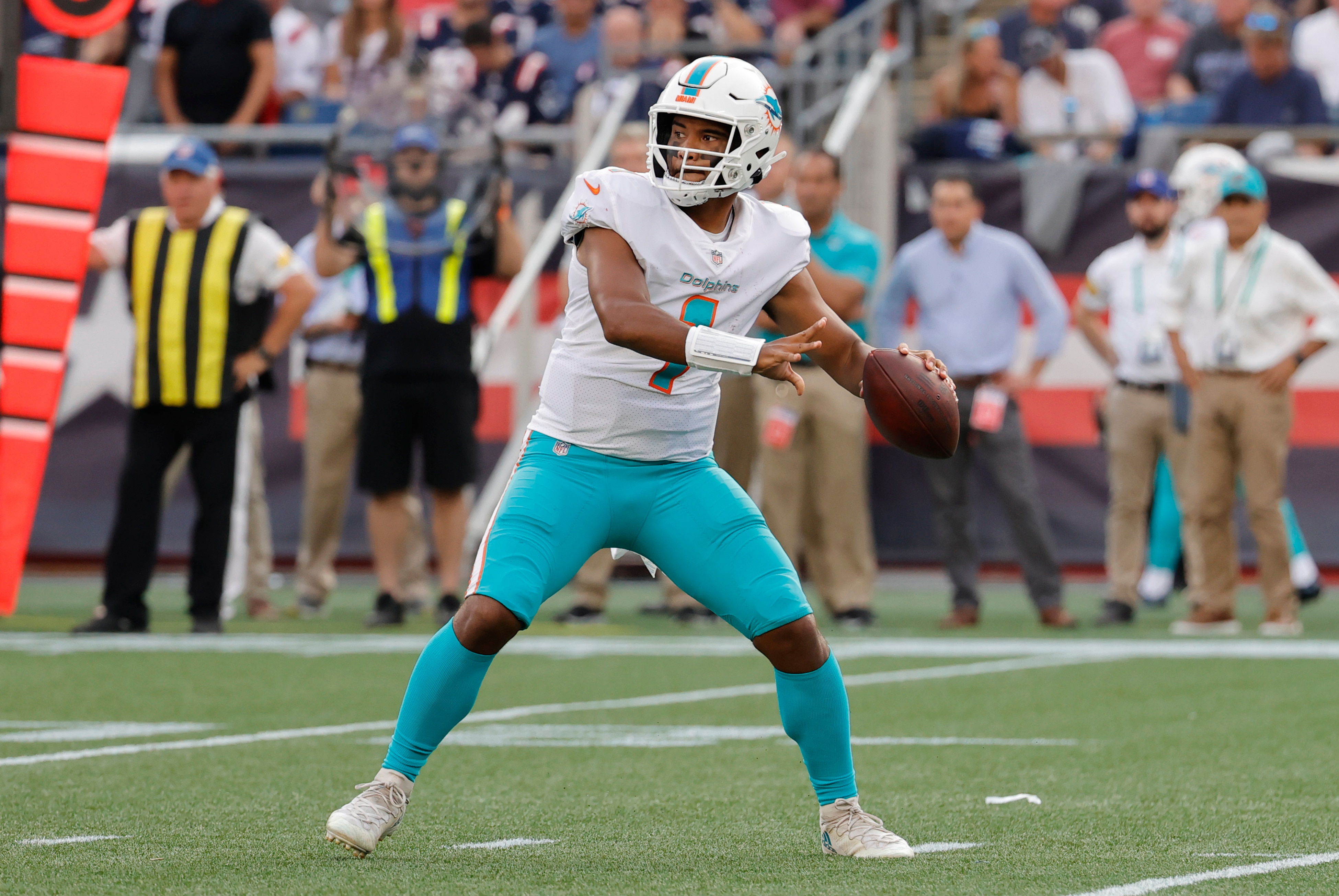 FOXBOROUGH, MA - SEPTEMBER 12: Miami Dolphins quarterback Tua Tagovailoa (1) rears back to pass during a game between the New England Patriots and the Miami Dolphins on September 12, 2021, at Gillette Stadium in Foxborough, Massachusetts. (Photo by Fred Kfoury III/Icon Sportswire via Getty Images)