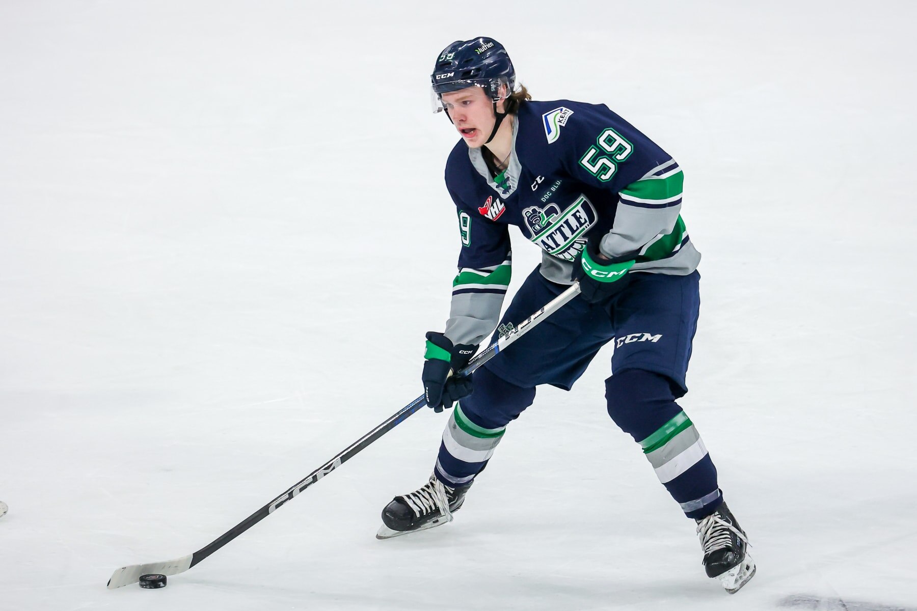 WINNIPEG, CANADA - MAY 12: Gracyn Sawchyn #59 of the Seattle Thunderbirds plays the puck during second period action against the Winnipeg ICE in Game One of the 2023 WHL Championship Series at Canada Life Centre on May 12, 2023 in Winnipeg, Manitoba, Canada. (Photo by Jonathan Kozub/Getty Images)