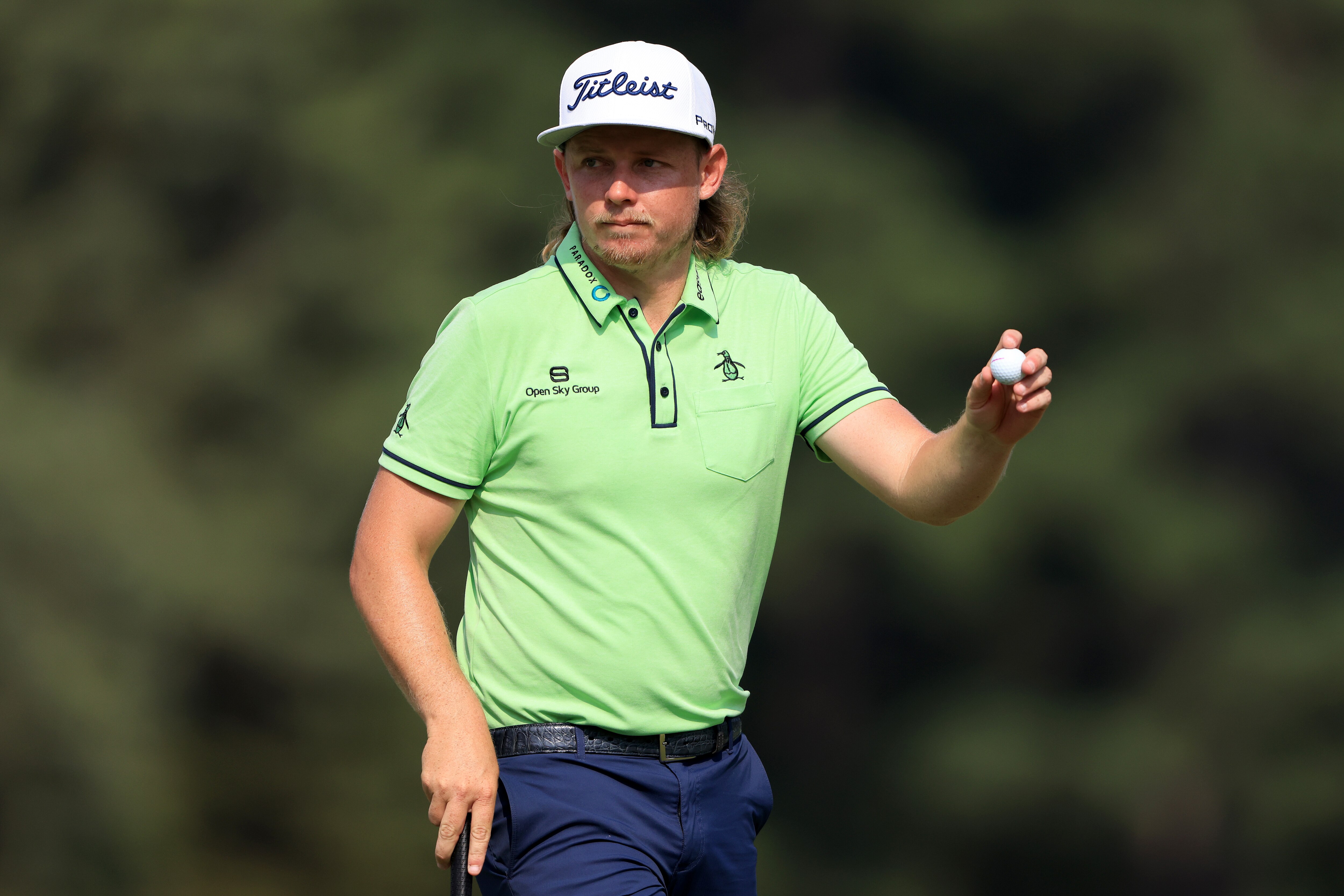 MEMPHIS, TENNESSEE - AUGUST 07: Cam Smith of Australia acknowledges the crowd on the 16th hole during the third round of the World Golf Championship-FedEx St Jude Invitational at TPC Southwind on August 07, 2021 in Memphis, Tennessee. (Photo by Sam Greenwood/Getty Images)