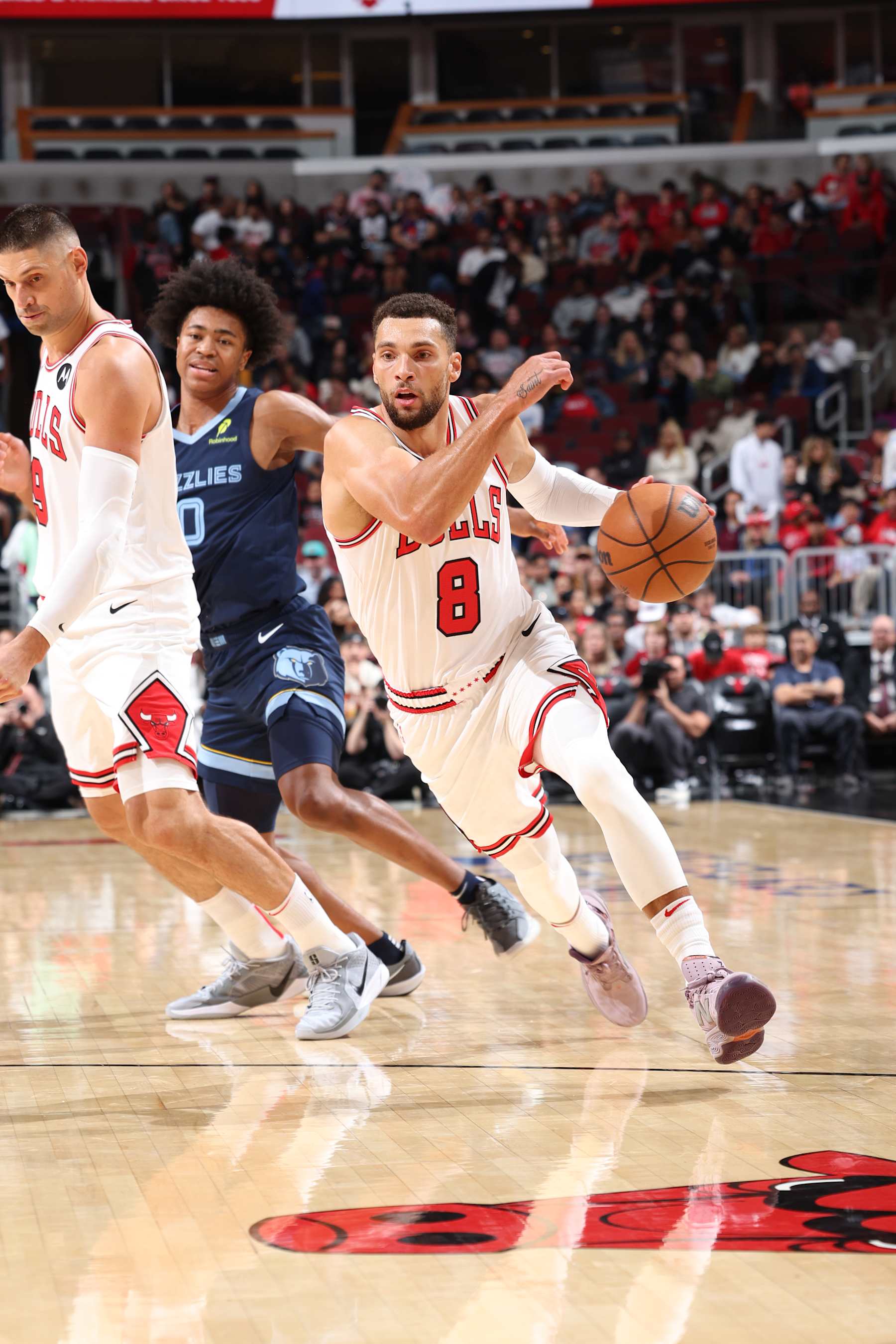 CHICAGO, IL - OCTOBER 12: Zach LaVine #8 of the Chicago Bulls drives to the basket during the game against the Memphis Grizzlies during a NBA preseason game on October 12, 2024 at United Center in Chicago, Illinois. NOTE TO USER: User expressly acknowledges and agrees that, by downloading and or using this photograph, User is consenting to the terms and conditions of the Getty Images License Agreement. Mandatory Copyright Notice: Copyright 2024 NBAE (Photo by Jeff Haynes/NBAE via Getty Images)