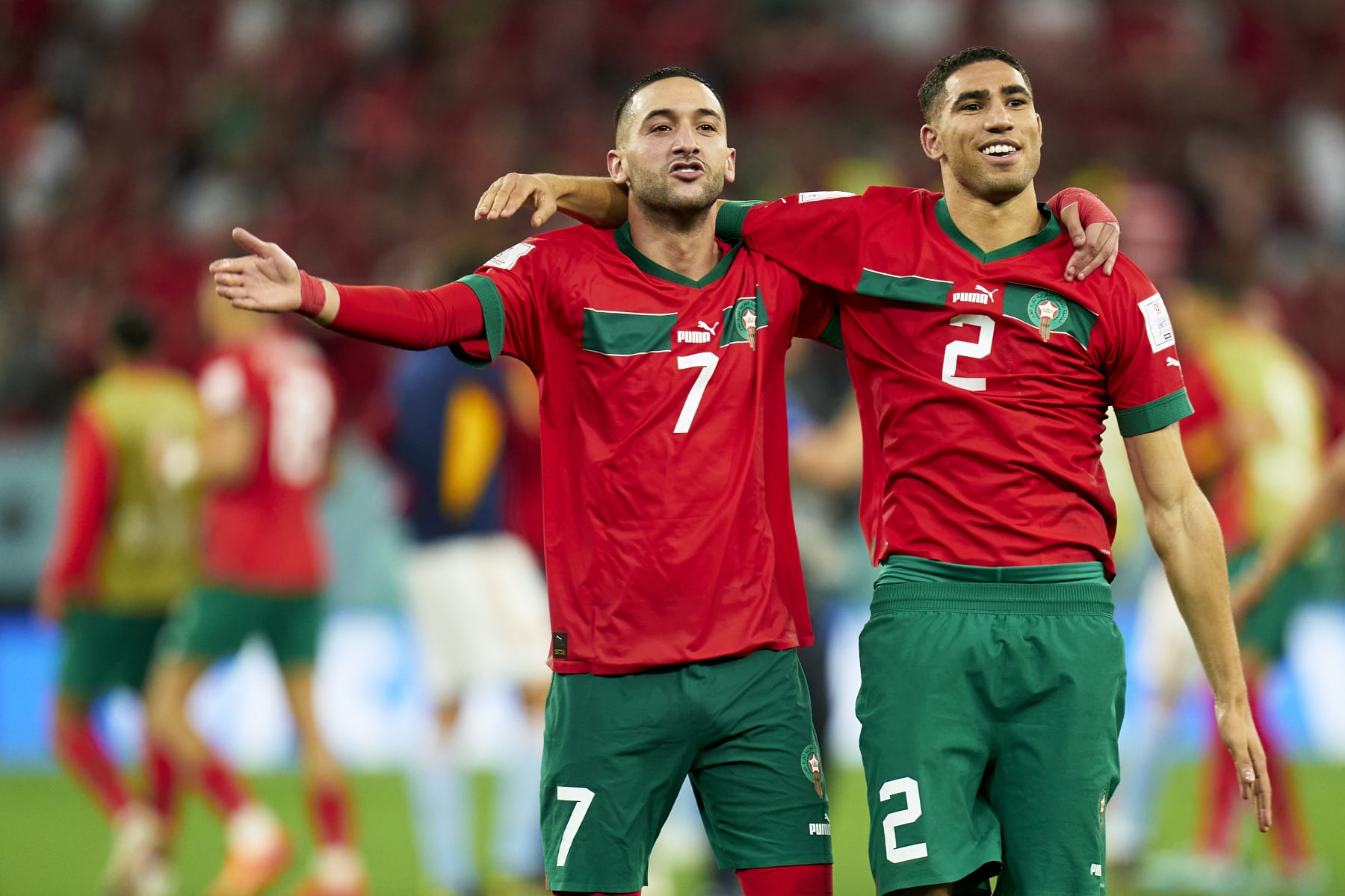 AL RAYYAN, QATAR - DECEMBER 06: Hakim Ziyech and Achraf Hakimi of Morocco celebrate after the team's victory during the FIFA World Cup Qatar 2022 Round of 16 match between Morocco and Spain at Education City Stadium on December 06, 2022 in Al Rayyan, Qatar. (Photo by Quality Sport Images/Getty Images)