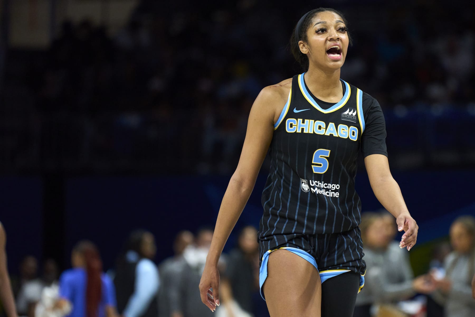 ARLINGTON, TEXAS - MAY 15: Angel Reese #5 of the Chicago Sky reacts after a play against the Dallas Wings at the College Park Center on May 15, 2024 in Arlington, Texas. NOTE TO USER: User expressly acknowledges and agrees that, by downloading and or using this photograph, User is consenting to the terms and conditions of the Getty Images License Agreement.  (Photo by Cooper Neill/Getty Images)