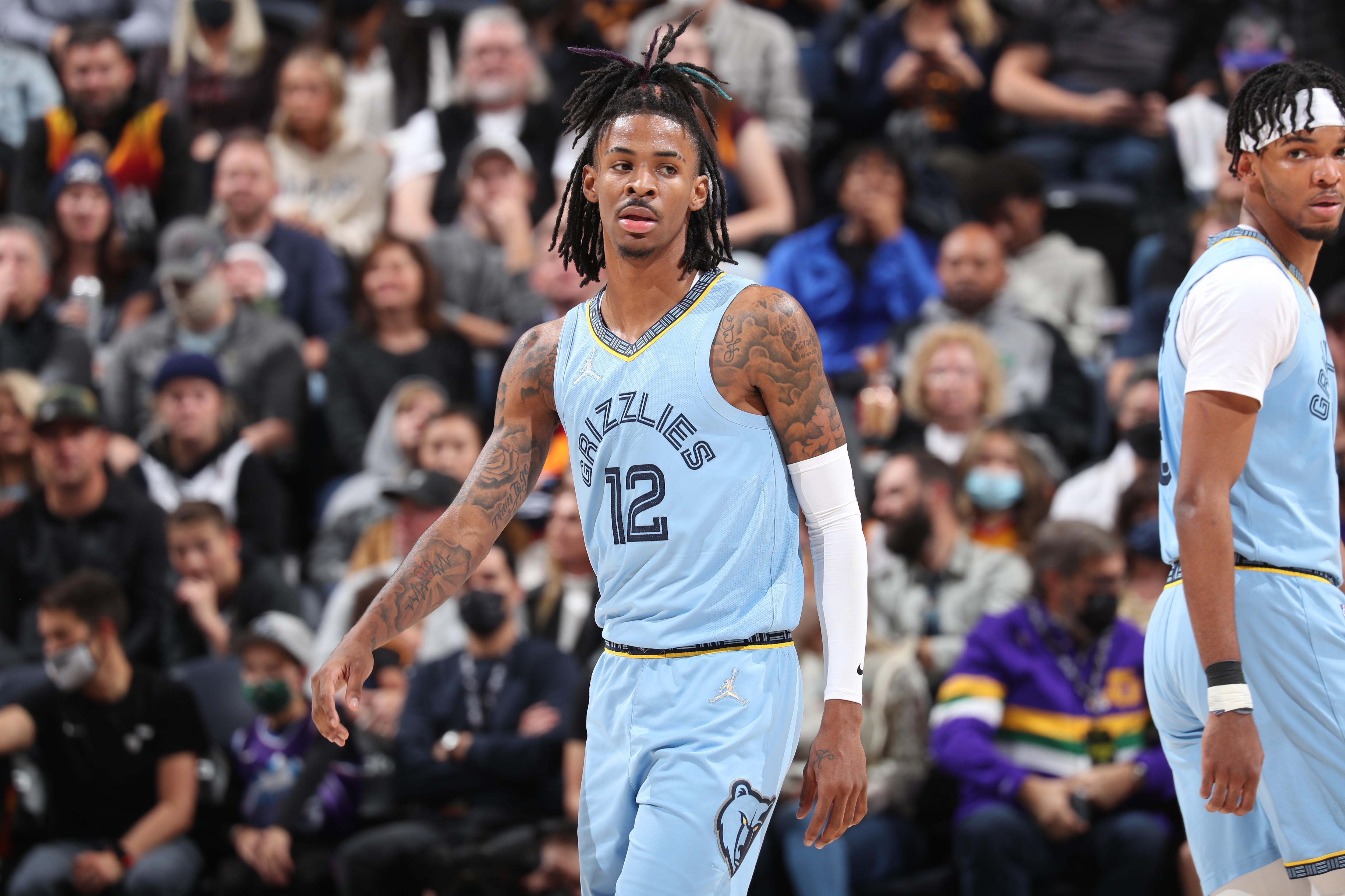 SALT LAKE CITY, UT - NOVEMBER 22: Ja Morant #12 of the Memphis Grizzlies looks on during the game against the Utah Jazz on November 22, 2021 at Vivint Smart Home Arena in Salt Lake City, Utah. NOTE TO USER: User expressly acknowledges and agrees that, by downloading and or using this Photograph, User is consenting to the terms and conditions of the Getty Images License Agreement. Mandatory Copyright Notice: Copyright 2021 NBAE (Photo by Melissa Majchrzak/NBAE via Getty Images)