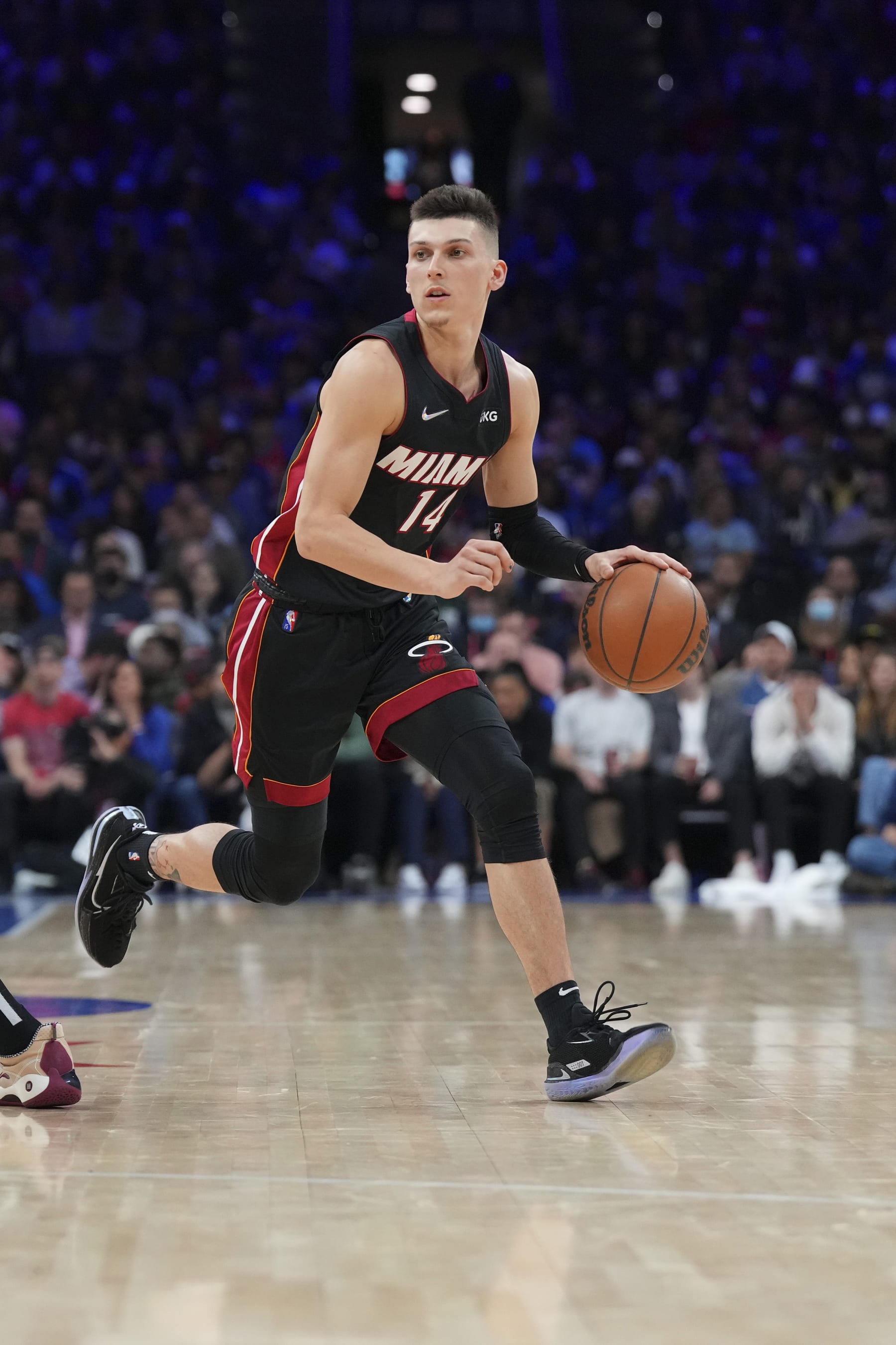PHILADELPHIA, PA - MAY 08: Tyler Herro #14 of the Miami Heat dribbles the ball against the Philadelphia 76ers during Game Four of the 2022 NBA Playoffs Eastern Conference Semifinals at the Wells Fargo Center on May 8, 2022 in Philadelphia, Pennsylvania. The 76ers defeated the Heat 116-108. NOTE TO USER: User expressly acknowledges and agrees that, by downloading and or using this photograph, User is consenting to the terms and conditions of the Getty Images License Agreement. (Photo by Mitchell Leff/Getty Images)