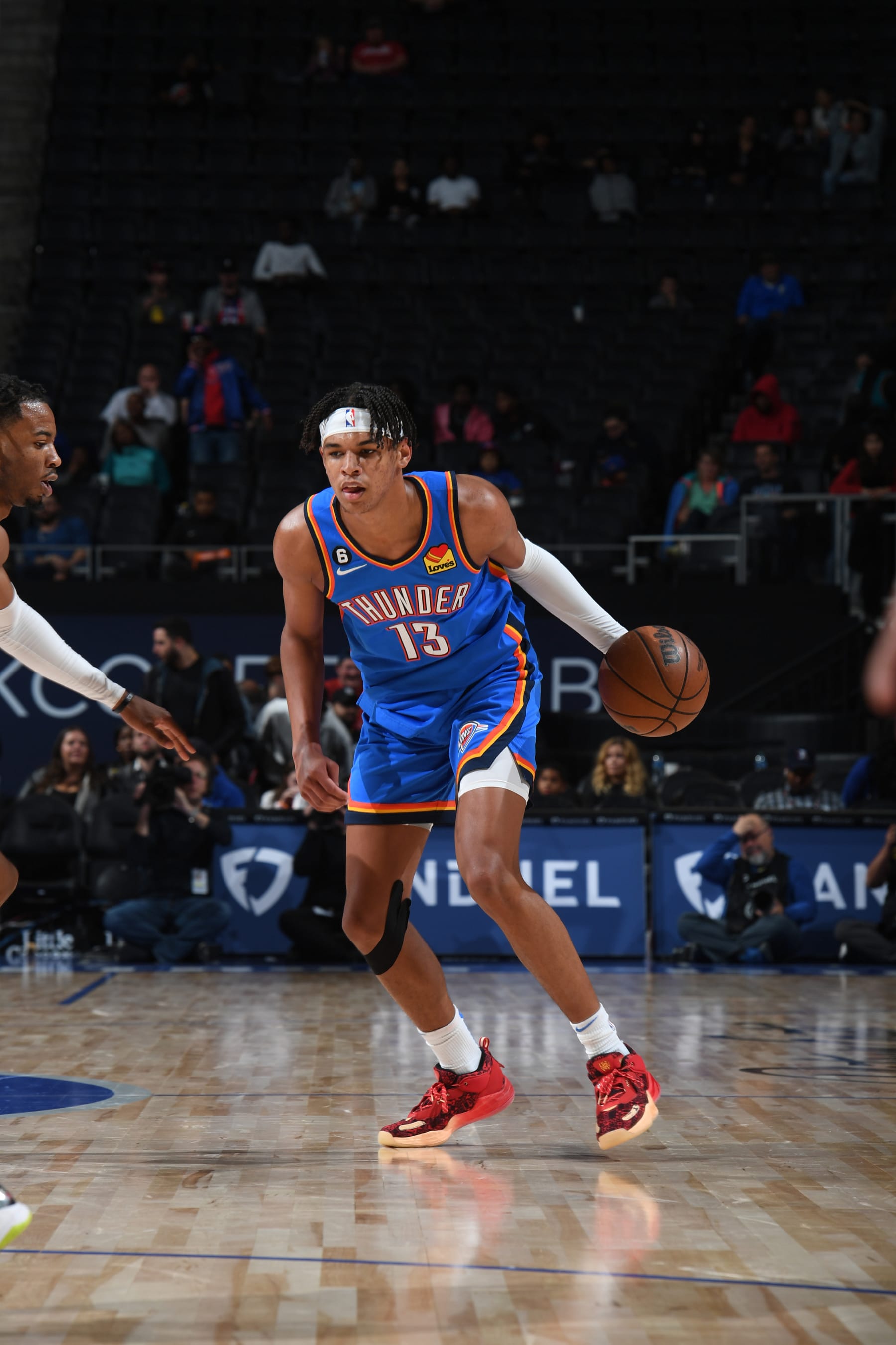 DETROIT, MI - OCTOBER 11: Ousmane Dieng #13 of the Oklahoma City Thunder drives to the basket during the game against the Detroit Pistons on October 11, 2022 at Little Caesars Arena in Detroit, Michigan. NOTE TO USER: User expressly acknowledges and agrees that, by downloading and/or using this photograph, User is consenting to the terms and conditions of the Getty Images License Agreement. Mandatory Copyright Notice: Copyright 2022 NBAE (Photo by Chris Schwegler/NBAE via Getty Images)