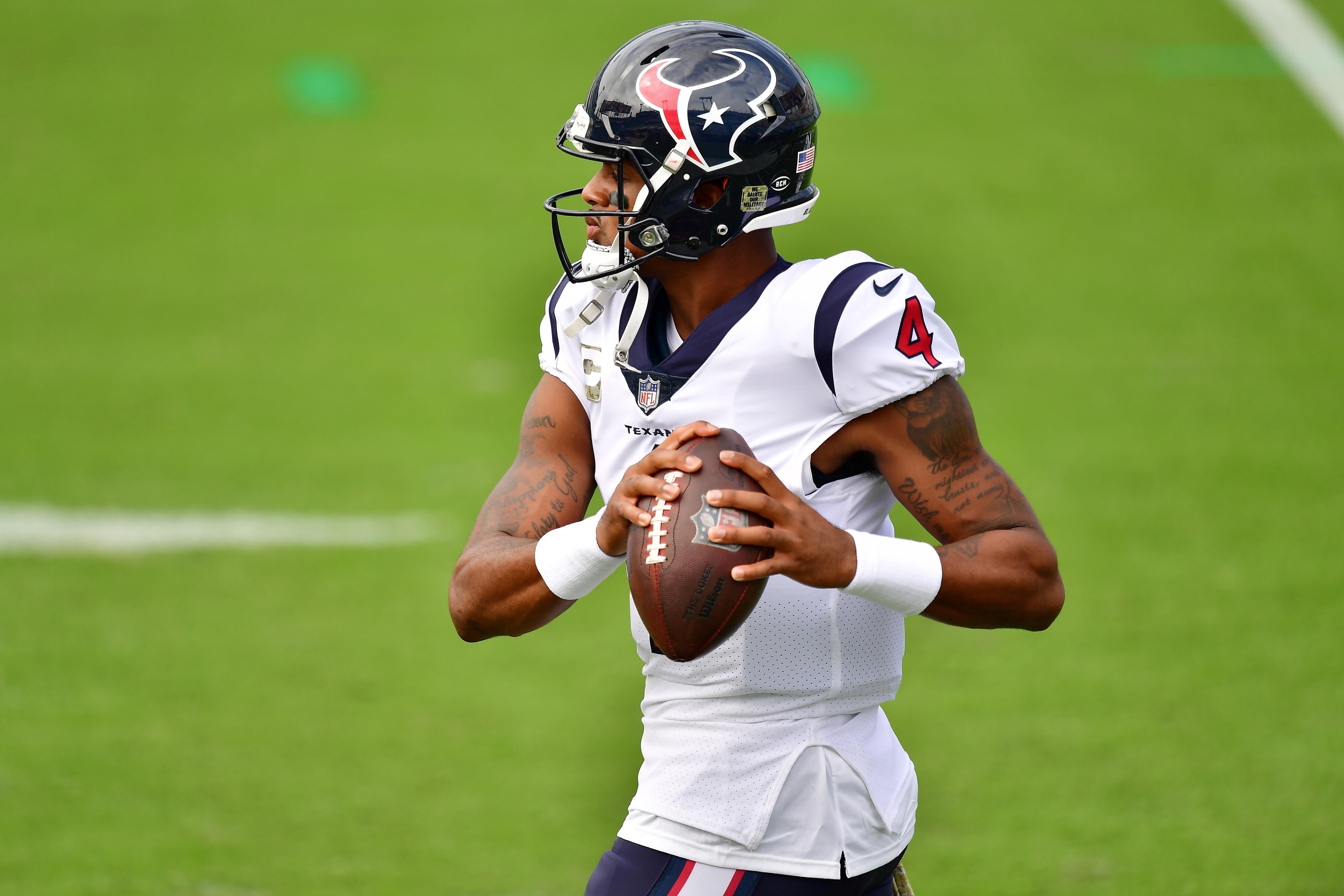 JACKSONVILLE, FLORIDA - NOVEMBER 08:  Deshaun Watson #4 of the Houston Texans participates in warmups prior to a game against the Jacksonville Jaguars at TIAA Bank Field on November 08, 2020 in Jacksonville, Florida. (Photo by Julio Aguilar/Getty Images)