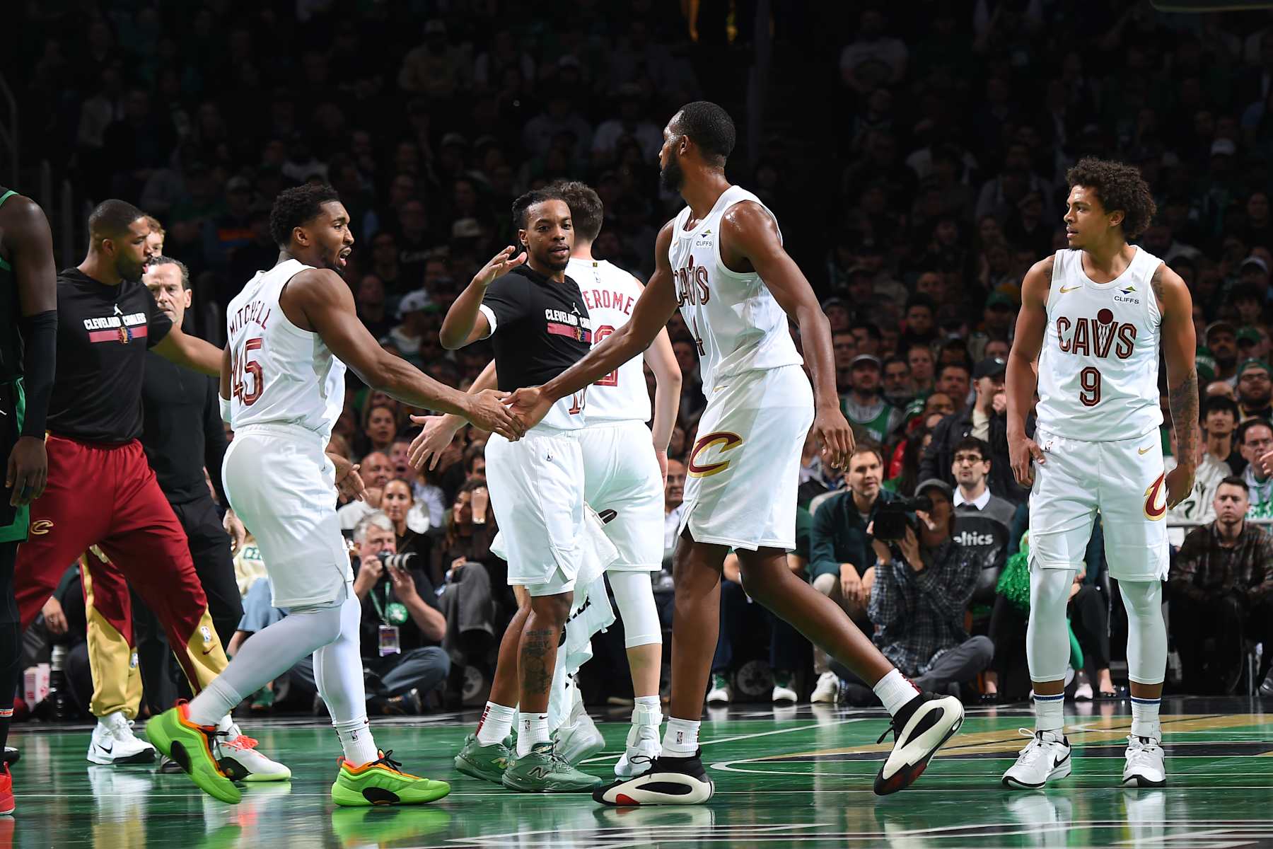 BOSTON, MA - NOVEMBER 19: Donovan Mitchell #45 and Evan Mobley #4 of the Cleveland Cavaliers high five during the game against the Boston Celtics  during the Emirates NBA Cup game on November 19, 2024 at TD Garden in Boston, Massachusetts. NOTE TO USER: User expressly acknowledges and agrees that, by downloading and/or using this Photograph, user is consenting to the terms and conditions of the Getty Images License Agreement. Mandatory Copyright Notice: Copyright 2024 NBAE (Photo by Brian Babineau/NBAE via Getty Images)