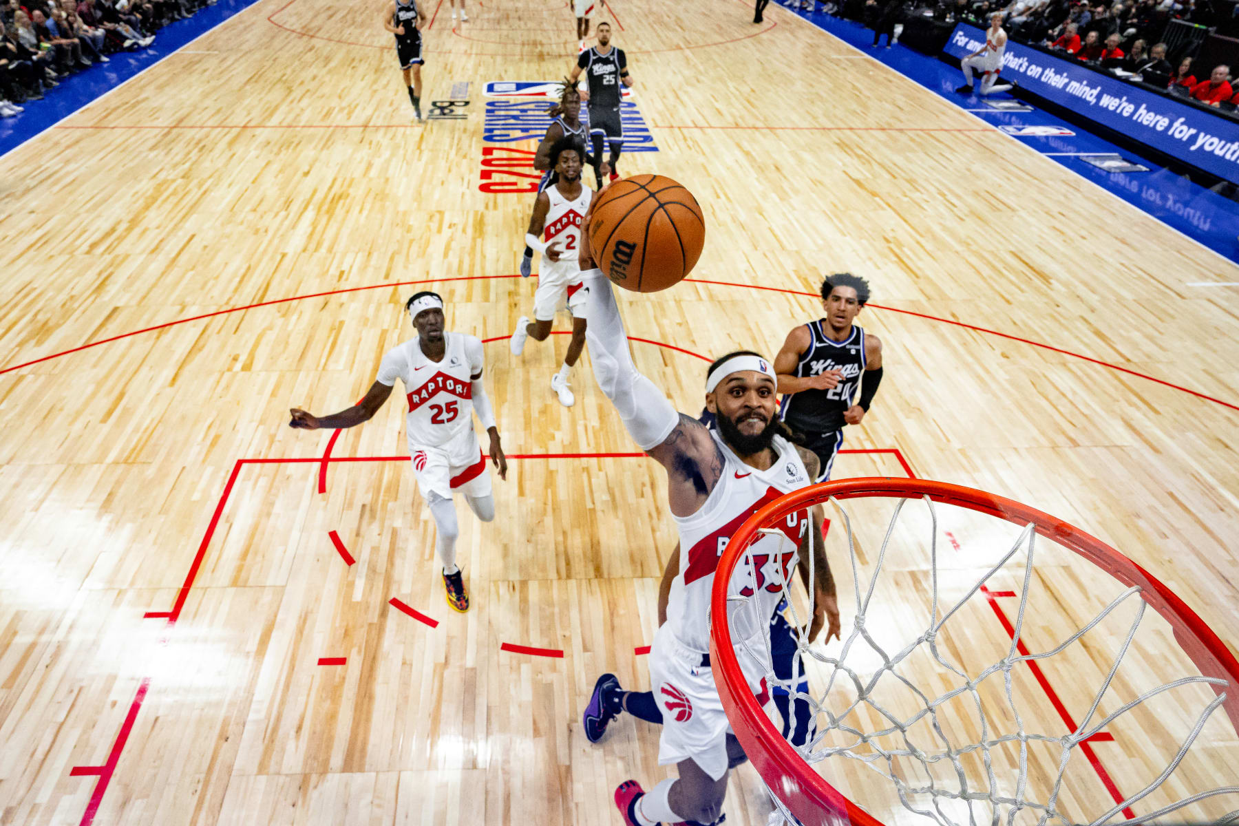 VANCOUVER, CANADA - OCTOBER 8: Gary Trent Jr. #33 of the Toronto Raptors drives to the basket during the game against the Sacramento Kings on October 8, 2023 at the Rogers Arena in Vancouver, British Columbia, Canada. NOTE TO USER: User expressly acknowledges and agrees that, by downloading and or using this Photograph, user is consenting to the terms and conditions of the Getty Images License Agreement. Mandatory Copyright Notice: Copyright 2023 NBAE (Photo by Jordan Jones/NBAE via Getty Images)