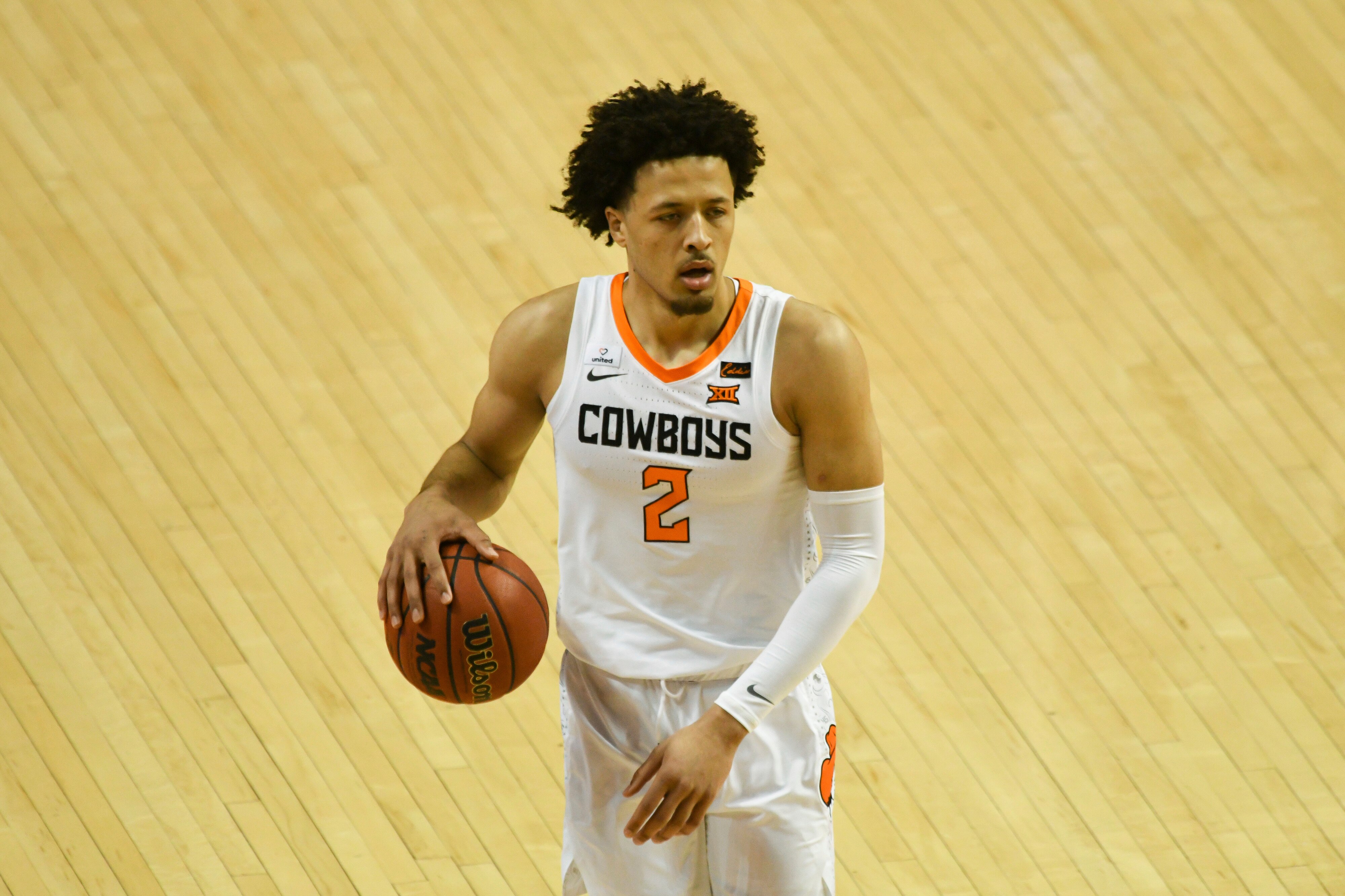 Oklahoma State guard Cade Cunningham (2)advances the ball during an NCAA college basketball game Monday, Feb. 22, 2021, in Stillwater, Okla. (AP Photo/Brody Schmidt)