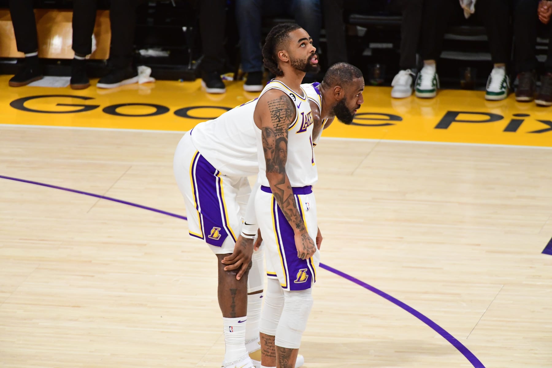 LOS ANGELES, CA - MAY 20: LeBron James #6 and D'Angelo Russell #1 of the Los Angeles Lakers look on during the game against the Denver Nuggets during Game Three of the Western Conference Finals on May 20, 2023 at Crypto.Com Arena in Los Angeles, California. NOTE TO USER: User expressly acknowledges and agrees that, by downloading and/or using this Photograph, user is consenting to the terms and conditions of the Getty Images License Agreement. Mandatory Copyright Notice: Copyright 2023 NBAE (Photo by Adam Pantozzi/NBAE via Getty Images)