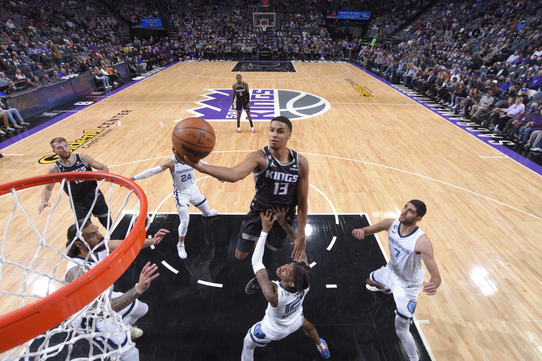 SACRAMENTO, CA - OCTOBER 27: Keegan Murray #13 of the Sacramento Kings drives to the basket during the game against the Memphis Grizzlies  on October 27, 2022 at Golden 1 Center in Sacramento, California. NOTE TO USER: User expressly acknowledges and agrees that, by downloading and or using this Photograph, user is consenting to the terms and conditions of the Getty Images License Agreement. Mandatory Copyright Notice: Copyright 2022 NBAE (Photo by Rocky Widner/NBAE via Getty Images)