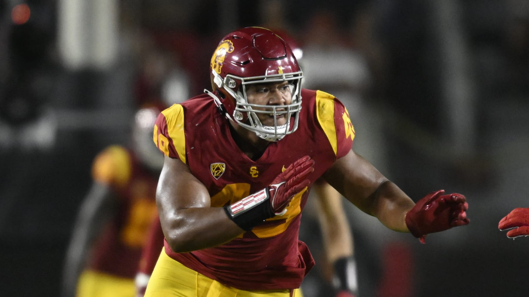Southern California defensive lineman Tuli Tuipulotu (49) rushes Fresno State during an NCAA football game on Saturday, Sept 17, 2022 in Los Angeles. (AP Photo/John McCoy)