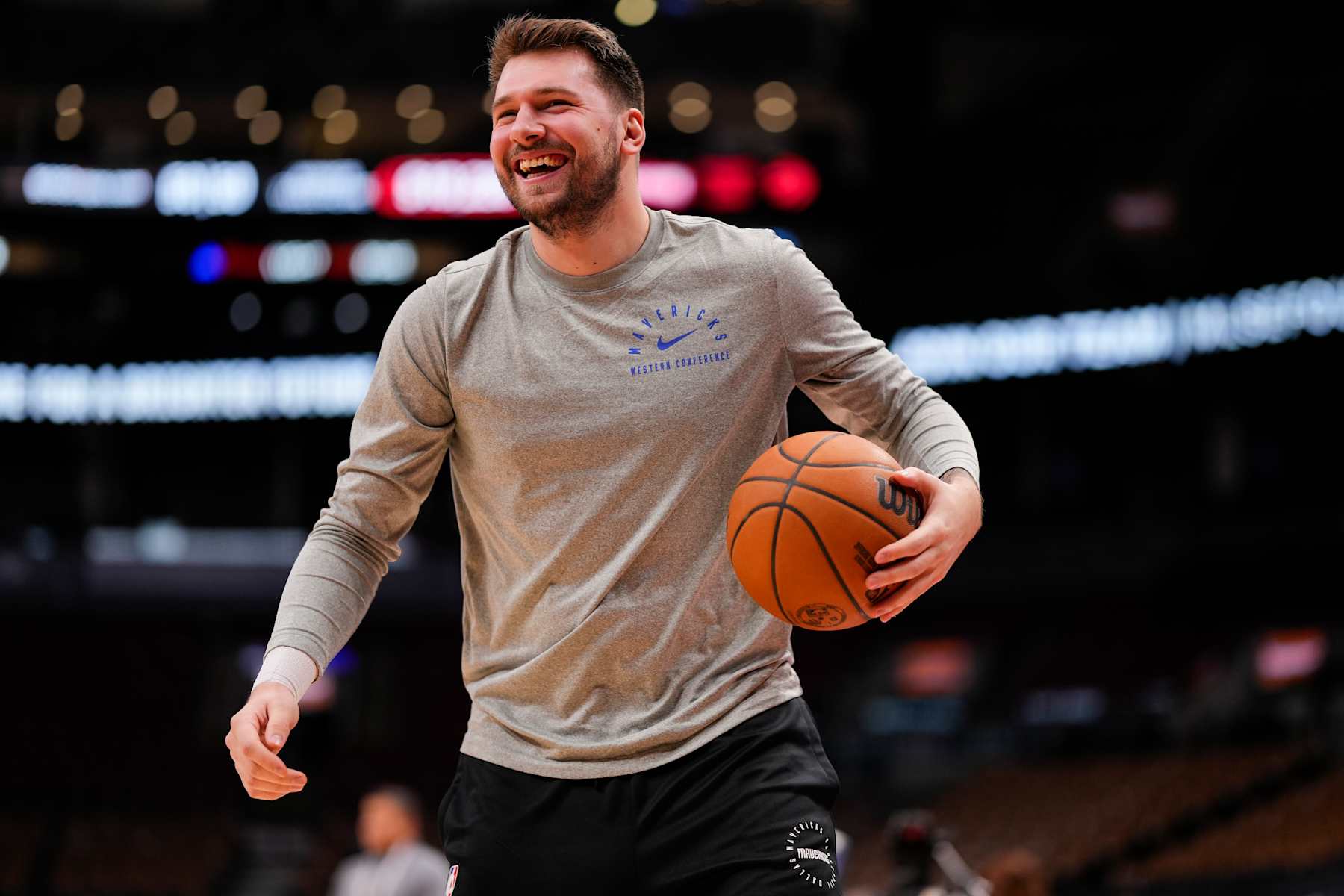 TORONTO, ON - DECEMBER 7: Luka Doncic #77 of the Dallas Mavericks laughs while warming up before facing the Toronto Raptors at Scotiabank Arena on December 7, 2024 in Toronto, Ontario, Canada. NOTE TO USER: User expressly acknowledges and agrees that, by downloading and/or using this Photograph, user is consenting to the terms and conditions of the Getty Images License Agreement. (Photo by Andrew Lahodynskyj/Getty Images)