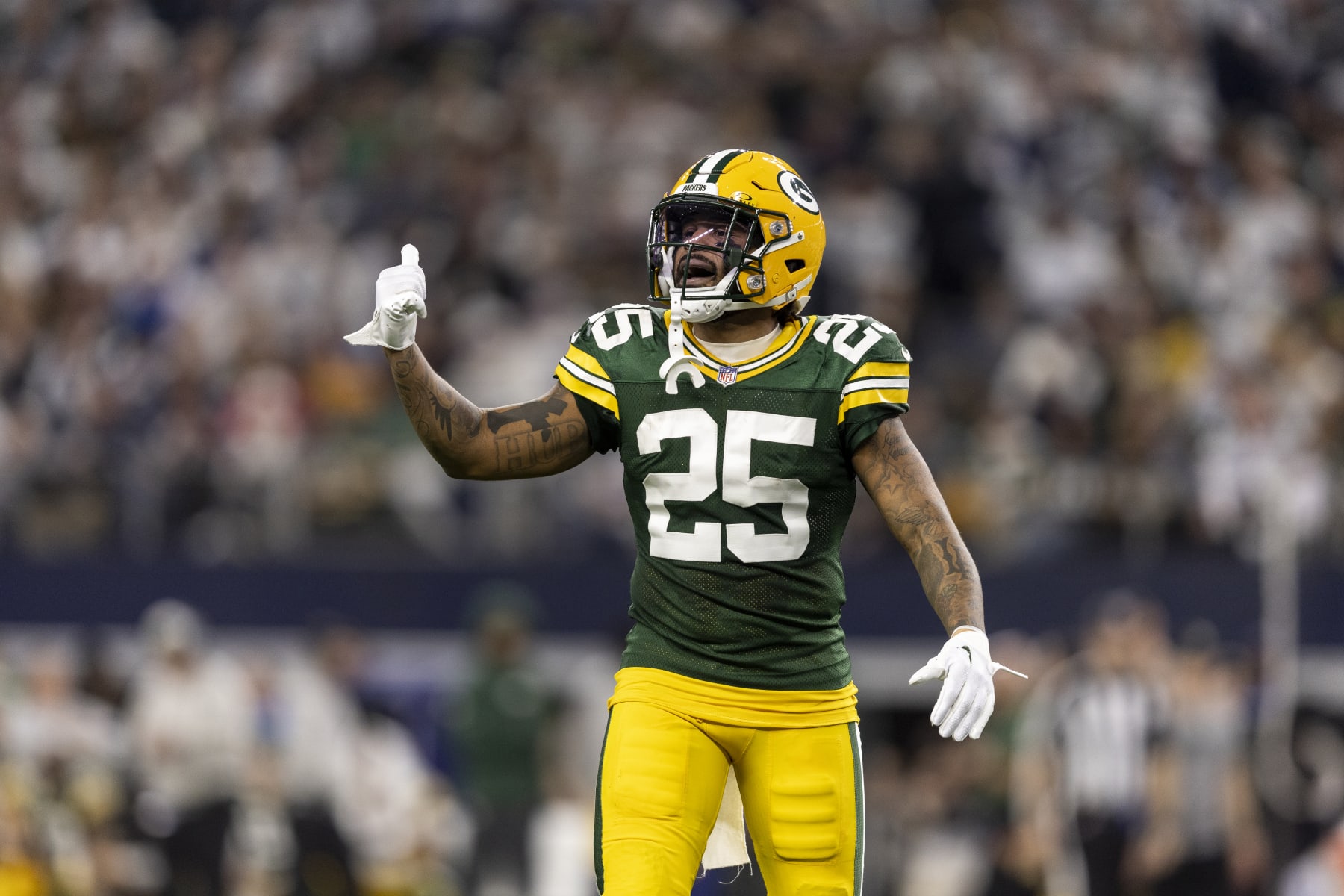 ARLINGTON, TEXAS - JANUARY 14: Keisean Nixon #25 of the Green Bay Packers reacts during an NFL wild-card playoff football game between the Dallas Cowboys and the Green Bay Packers at AT&T Stadium on January 14, 2024 in Arlington, Texas. (Photo by Michael Owens/Getty Images)