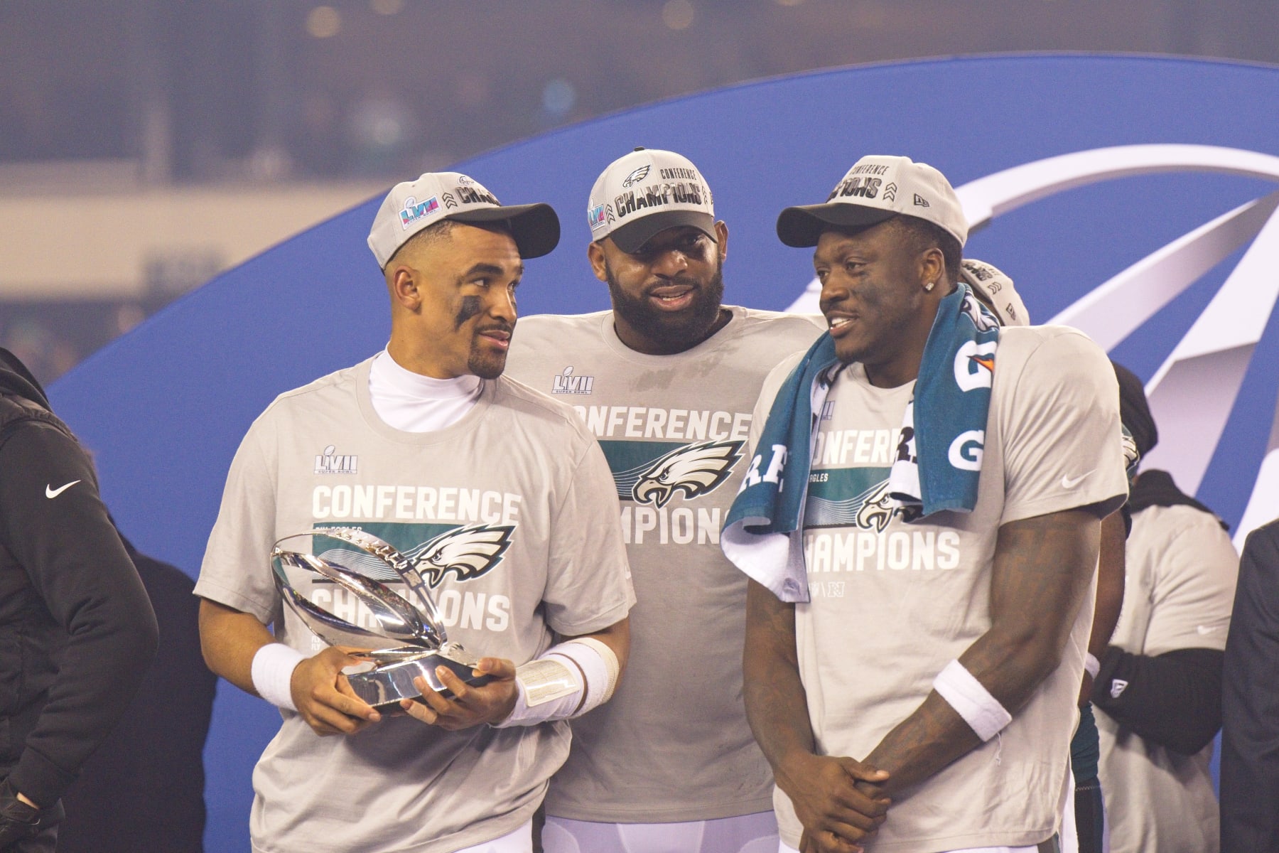 PHILADELPHIA, PA - JANUARY 29: Philadelphia Eagles quarterback Jalen Hurts (1), Philadelphia Eagles defensive tackle Fletcher Cox (91) and Philadelphia Eagles wide receiver A.J. Brown (11) hold the trophy during the Championship game between the San Fransisco 49ers and the Philadelphia Eagles on January 29, 2023. (Photo by Andy Lewis/Icon Sportswire via Getty Images)
