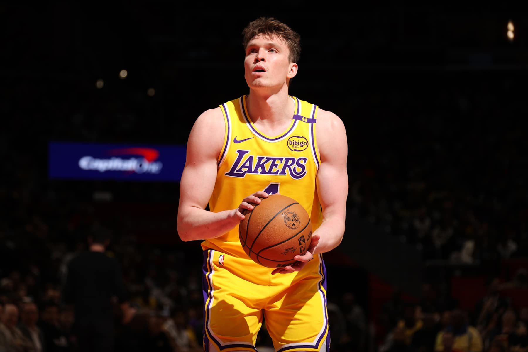 WASHINGTON, DC -  JANUARY 30:  Dalton Knecht #4 of the Los Angeles Lakers shoots a free throw during the game against the Washington Wizards on January 30, 2025 at Capital One Arena in Washington, DC. NOTE TO USER: User expressly acknowledges and agrees that, by downloading and or using this Photograph, user is consenting to the terms and conditions of the Getty Images License Agreement. Mandatory Copyright Notice: Copyright 2025 NBAE (Photo by Stephen Gosling/NBAE via Getty Images)