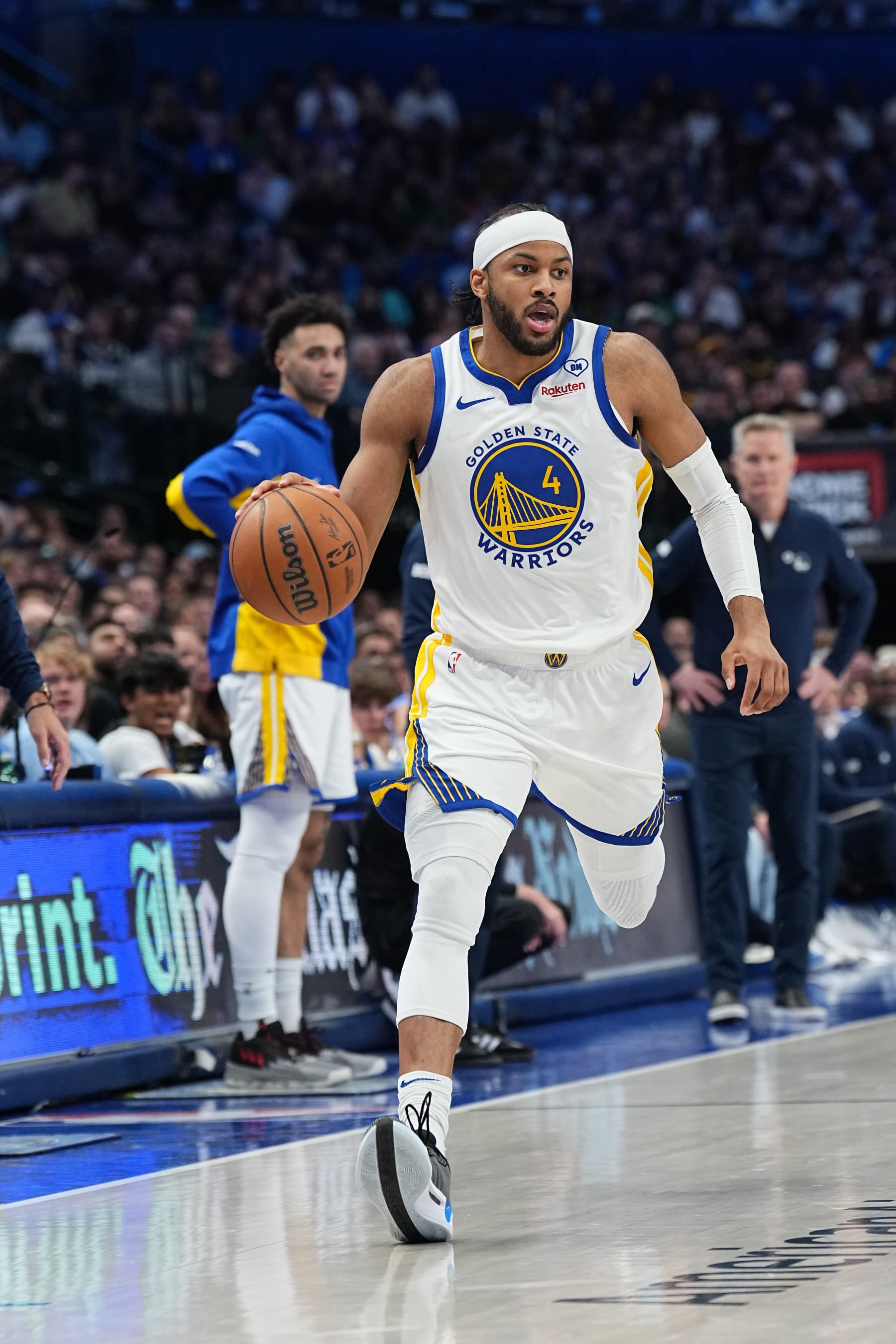 DALLAS, TX - APRIL 5:  Moses Moody #4 of the Golden State Warriors handles the ball during the game against the Dallas Mavericks on April 5, 2024 at the American Airlines Center in Dallas, Texas. NOTE TO USER: User expressly acknowledges and agrees that, by downloading and or using this photograph, User is consenting to the terms and conditions of the Getty Images License Agreement. Mandatory Copyright Notice: Copyright 2024 NBAE (Photo by Glenn James/NBAE via Getty Images)