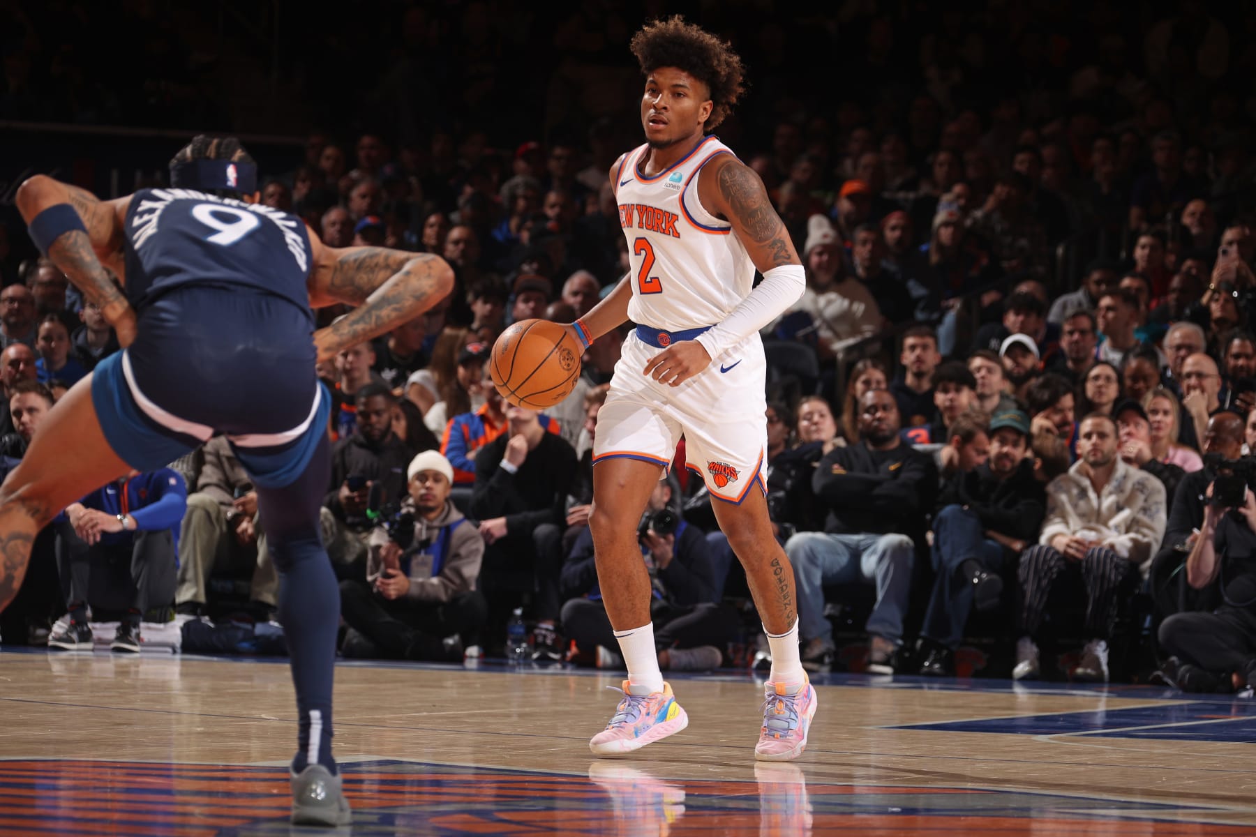 NEW YORK, NY - JANUARY 1: Miles McBride #2 of the New York Knicks brings the ball up court against the Minnesota Timberwolves on January 1, 2024 at Madison Square Garden in New York City, New York.  NOTE TO USER: User expressly acknowledges and agrees that, by downloading and or using this photograph, User is consenting to the terms and conditions of the Getty Images License Agreement. Mandatory Copyright Notice: Copyright 2024 NBAE  (Photo by Nathaniel S. Butler/NBAE via Getty Images)