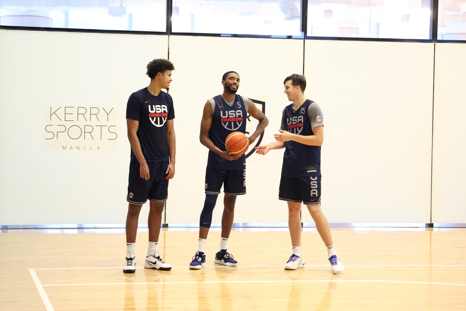 MANILA, PHILIPPINES - AUGUST 24: Cam Johnson, Mikal Bridges and Austin Reaves of the USA Men's Senior National Team chats during practice on August 24, 2023 at Kerry Arena in Manila, Philippines. NOTE TO USER: User expressly acknowledges and agrees that, by downloading and/or using this photograph, user is consenting to the terms and conditions of the Getty Images License Agreement. Mandatory Copyright Notice: Copyright 2023 NBAE (Photo by Brian Choi/NBAE via Getty Images)