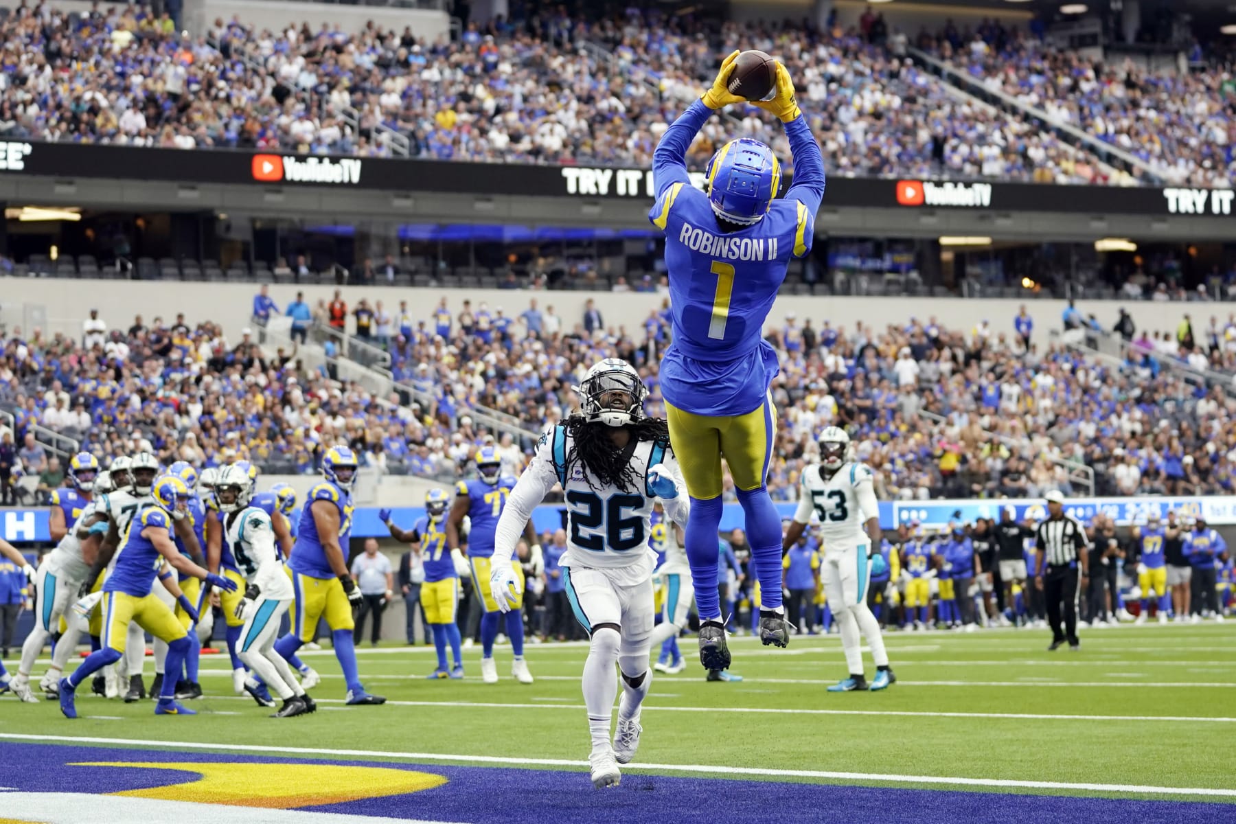 FILE - Los Angeles Rams wide receiver Allen Robinson II (1) makes a touchdown catch over Carolina Panthers cornerback Donte Jackson (26) during the first half of an NFL football game on Oct. 16, 2022, in Inglewood, Calif. The Rams are in the process of trading Robinson and a seventh-round to Pittsburgh in exchange for a seventh-round pick, according to a source with knowledge of the pending agreement. The deal is pending Robinson passing a physical in Pittsburgh on Wednesday, April 19, 2023. (AP Photo/Ashley Landis, File)