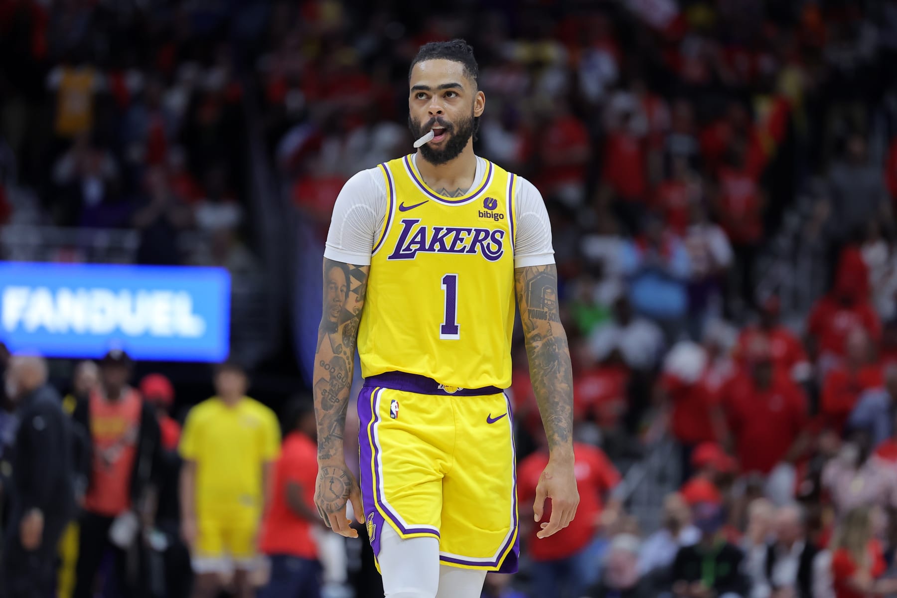 NEW ORLEANS, LOUISIANA - APRIL 16: D'Angelo Russell #1 of the Los Angeles Lakers reacts against the New Orleans Pelicans during a play-in tournament game at the Smoothie King Center on April 16, 2024 in New Orleans, Louisiana. NOTE TO USER: User expressly acknowledges and agrees that, by downloading and or using this Photograph, user is consenting to the terms and conditions of the Getty Images License Agreement. (Photo by Jonathan Bachman/Getty Images) NEW ORLEANS, LOUISIANA - APRIL 16: D'Angelo Russell #1 of the Los Angeles Lakers reacts against the New Orleans Pelicans during a play-in tournament game at the Smoothie King Center on April 16, 2024 in New Orleans, Louisiana. NOTE TO USER: User expressly acknowledges and agrees that, by downloading and or using this Photograph, user is consenting to the terms and conditions of the Getty Images License Agreement. (Photo by Jonathan Bachman/Getty Images)