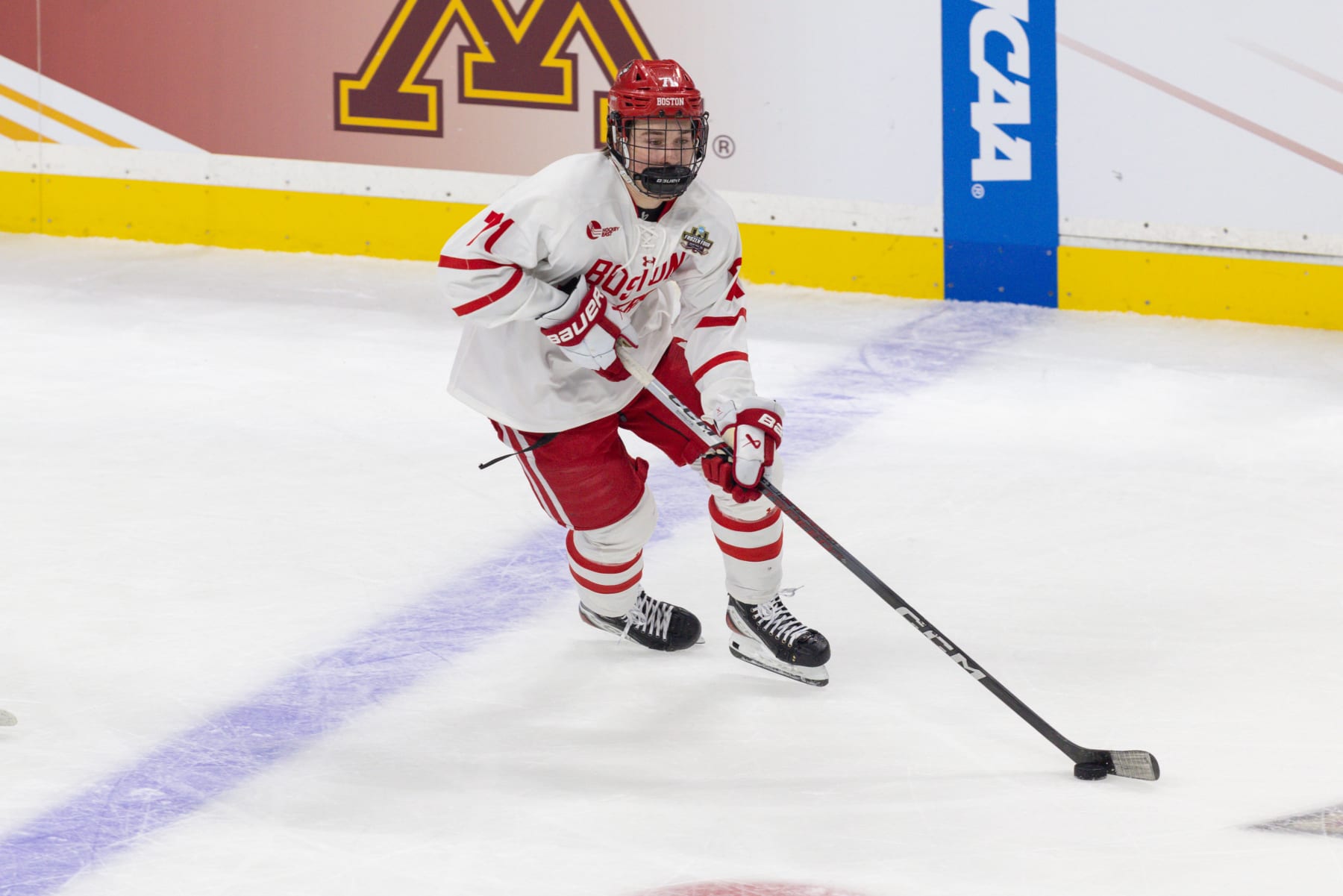 ST. PAUL, MN - APRIL 11: Boston University Terriers forward Macklin Celebrini (71) skates with the puck during the first period of the men's Frozen Four semifinal game between the Boston University Terriers and the Denver Pioneers on April 11th, 2024, in St. Paul, Minnesota. (Photo by Bailey Hillesheim/Icon Sportswire via Getty Images)