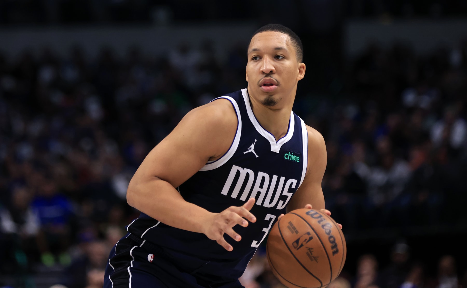 DALLAS, TX - JANUARY 27:  Grant Williams #3 of the Dallas Mavericks handles the ball against the Sacramento Kings in the second half at American Airlines Center on January 27, 2024 in Dallas, Texas. NOTE TO USER: User expressly acknowledges and agrees that, by downloading and or using this photograph, User is consenting to the terms and conditions of the Getty Images License Agreement. (Photo by Ron Jenkins/Getty Images)