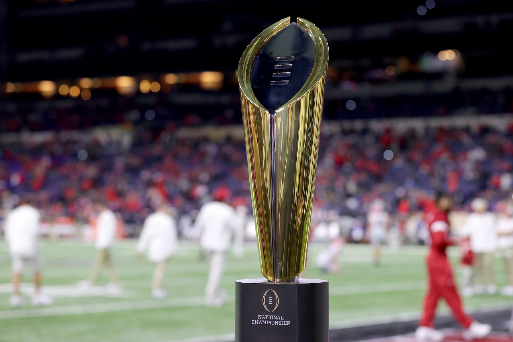 INDIANAPOLIS, INDIANA - JANUARY 10: The National Championship Trophy is seen on the field prior to the 2022 CFP National Championship Game between the Alabama Crimson Tide and Georgia Bulldogs at Lucas Oil Stadium on January 10, 2022 in Indianapolis, Indiana. (Photo by Kevin C. Cox/Getty Images)