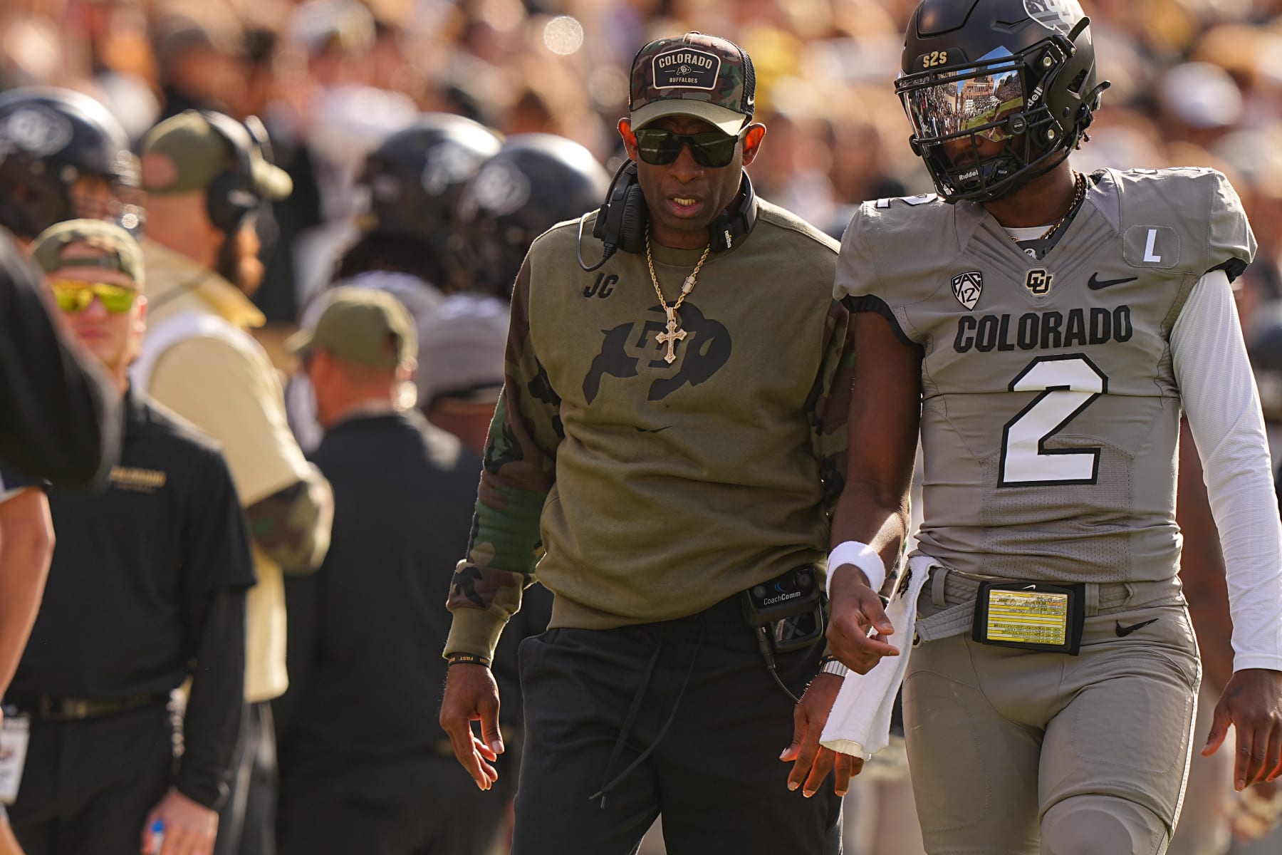 College Football: Colorado head coach Deion Sanders and Shedeur Sanders (2) talking vs Arizona at Folsom Field. 
Boulder, CO 11/11/2023 
CREDIT: Erick W. Rasco (Photo by Erick W. Rasco/Sports Illustrated via Getty Images) 
(Set Number: X164462)