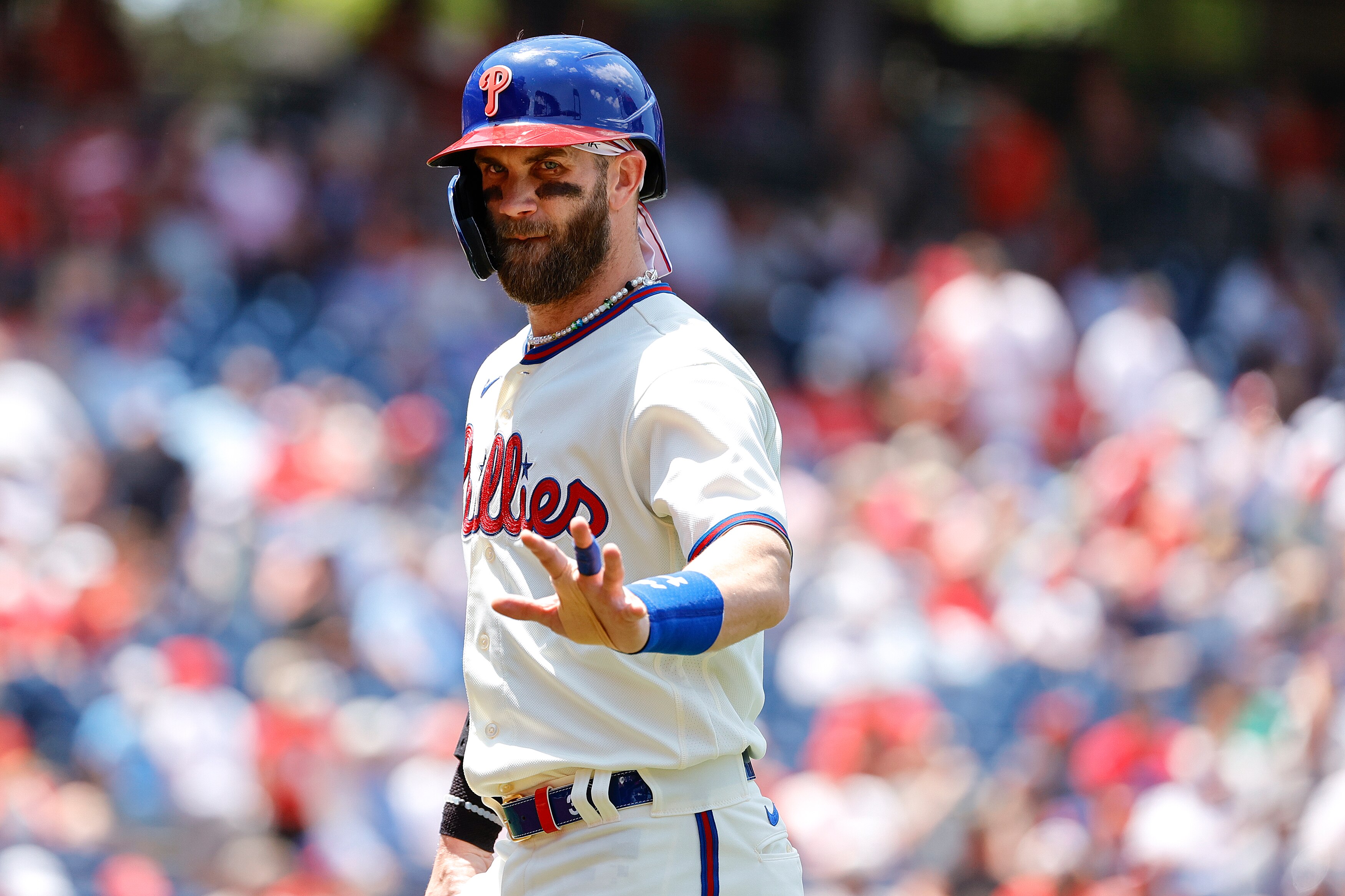 PHILADELPHIA, PENNSYLVANIA - JUNE 15: Bryce Harper #3 of the Philadelphia Phillies waves during the first inning against the Miami Marlins at Citizens Bank Park on June 15, 2022 in Philadelphia, Pennsylvania. (Photo by Tim Nwachukwu/Getty Images)