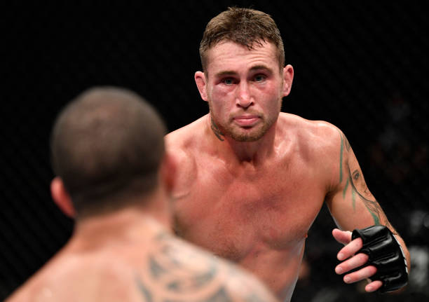 ABU DHABI, UNITED ARAB EMIRATES - JULY 26: (R-L) Darren Till of England battles Robert Whittaker of New Zealand in their middleweight fight during the UFC Fight Night event inside Flash Forum on UFC Fight Island on July 26, 2020 in Yas Island, Abu Dhabi, United Arab Emirates. (Photo by Jeff Bottari/Zuffa LLC via Getty Images)