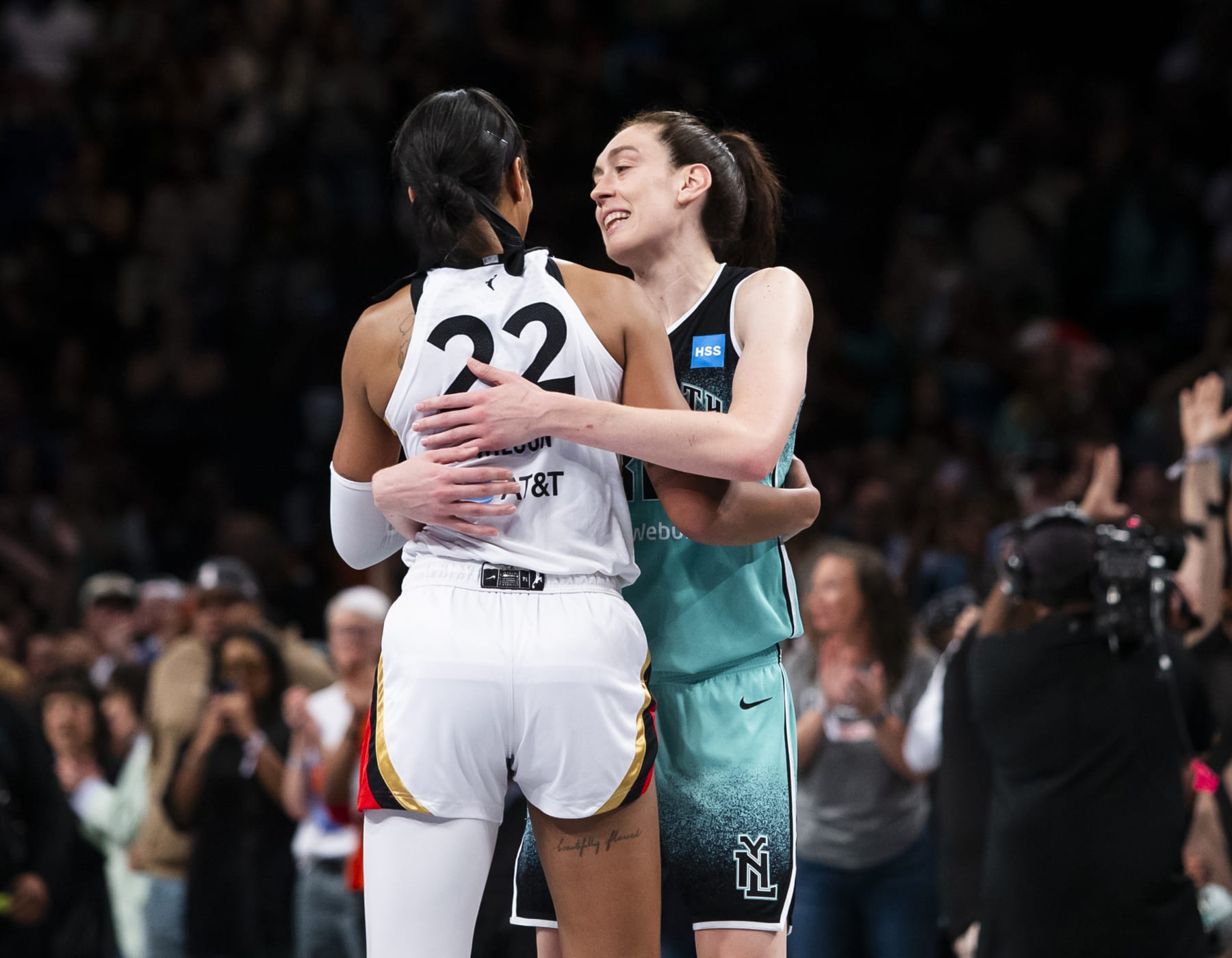 NEW YORK, NEW YORK - AUGUST 28: Breanna Stewart #30 of the New York Liberty and A'ja Wilson #22 of the Las Vegas Aces hug after the game at the Barclays Center on August 28, 2023 in New York City. (Photo by Michelle Farsi/Getty Images)