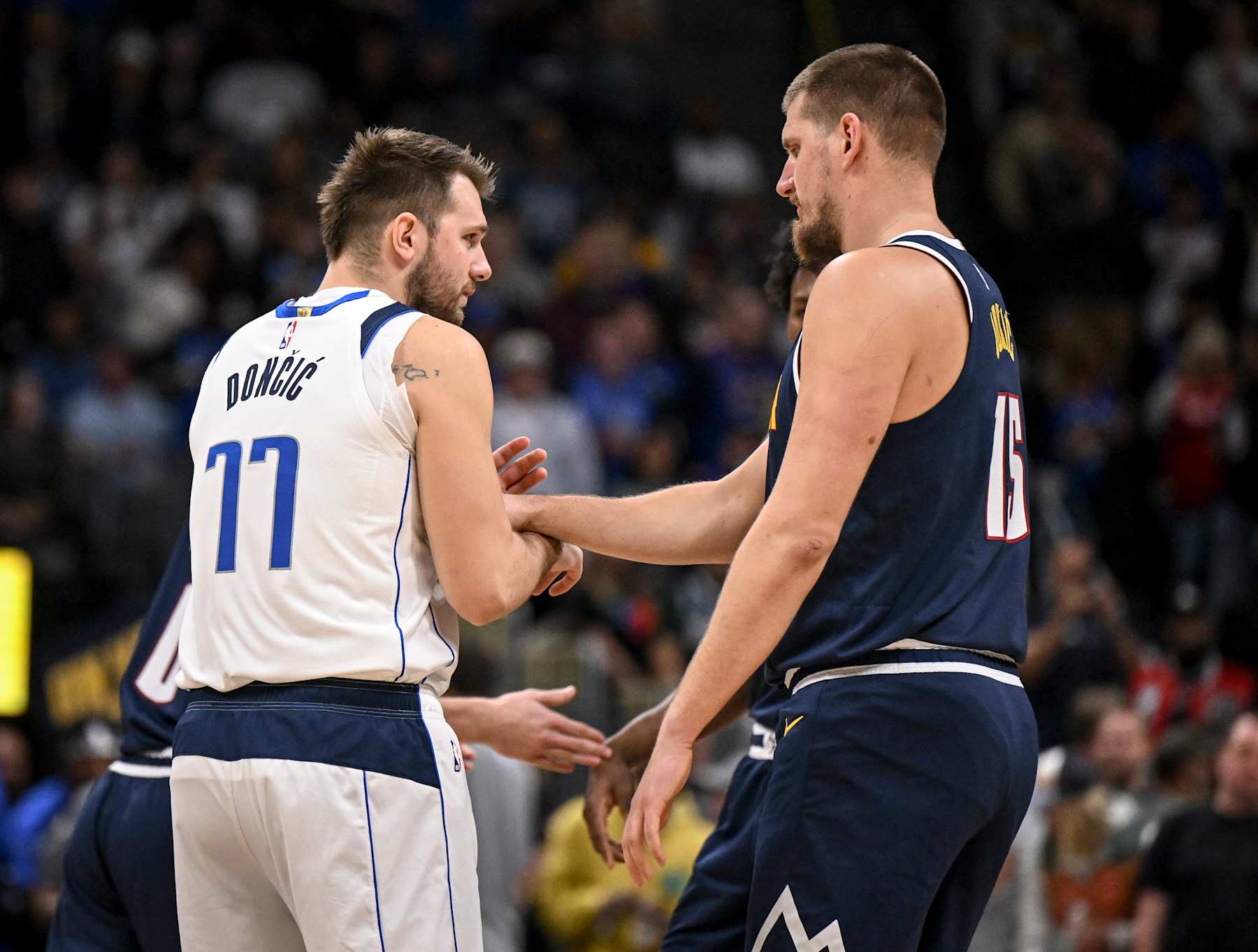 DENVER, CO - NOVEMBER 10: Nikola Jokic (15) of the Denver Nuggets jokes with Luka Doncic (77) of the Dallas Mavericks during the first quarter at Ball Arena in Denver, Colorado on Sunday, November 10, 2024. (Photo by AAron Ontiveroz/The Denver Post) DENVER, CO - NOVEMBER 10: Nikola Jokic (15) of the Denver Nuggets jokes with Luka Doncic (77) of the Dallas Mavericks during the first quarter at Ball Arena in Denver, Colorado on Sunday, November 10, 2024. (Photo by AAron Ontiveroz/The Denver Post)