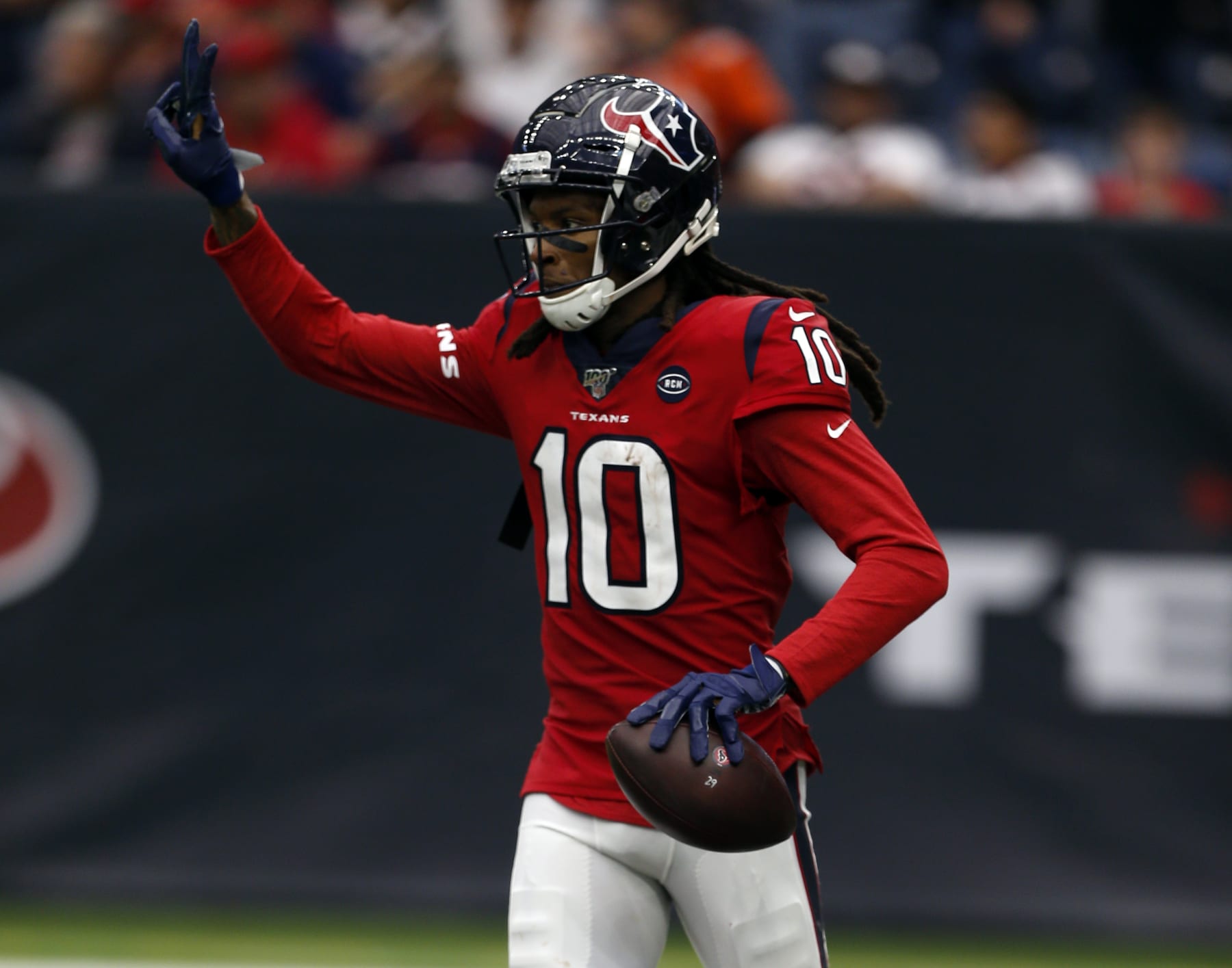 HOUSTON, TEXAS - DECEMBER 08: DeAndre Hopkins #10 of the Houston Texans caches a 43 yard pass for a touchdown during the third quarter against the Denver Broncos at NRG Stadium on December 08, 2019 in Houston, Texas. (Photo by Bob Levey/Getty Images)